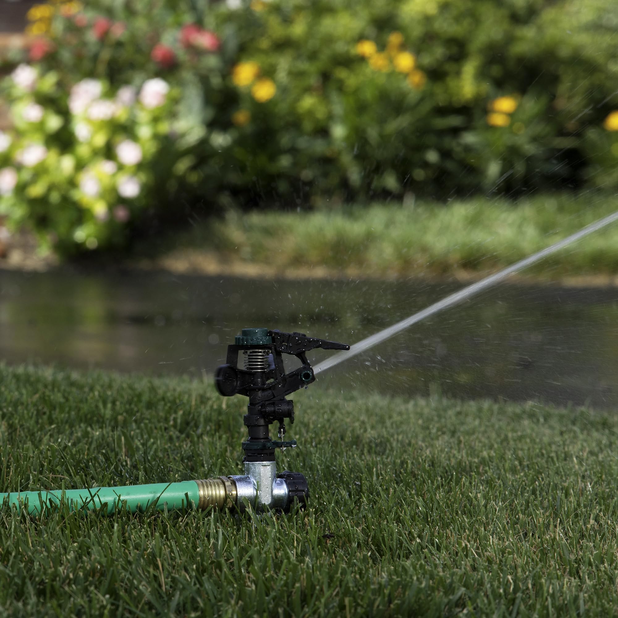 Amazon.com : Melnor 65152AMZ Plastic Pulsating Sprinkler on Metal