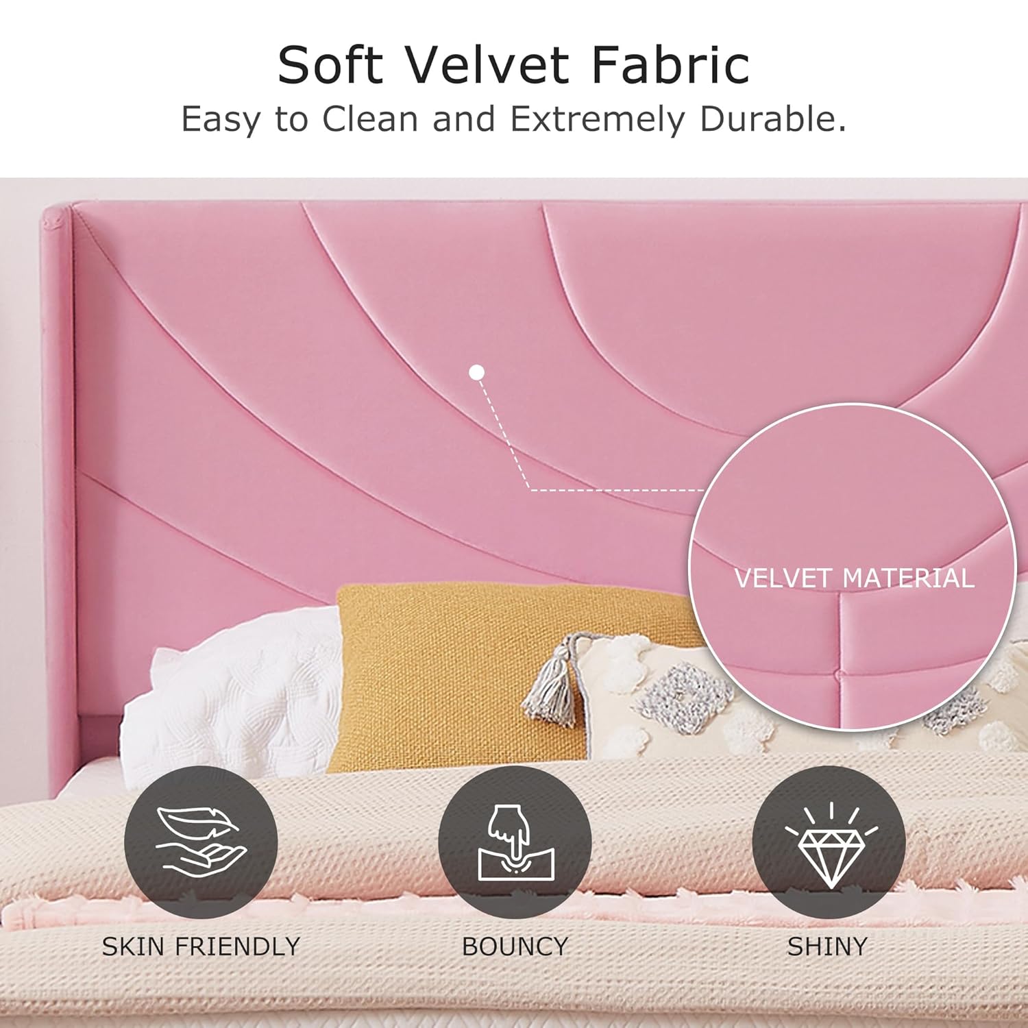 Close-up of the pink velvet upholstered headboard showing texture and design