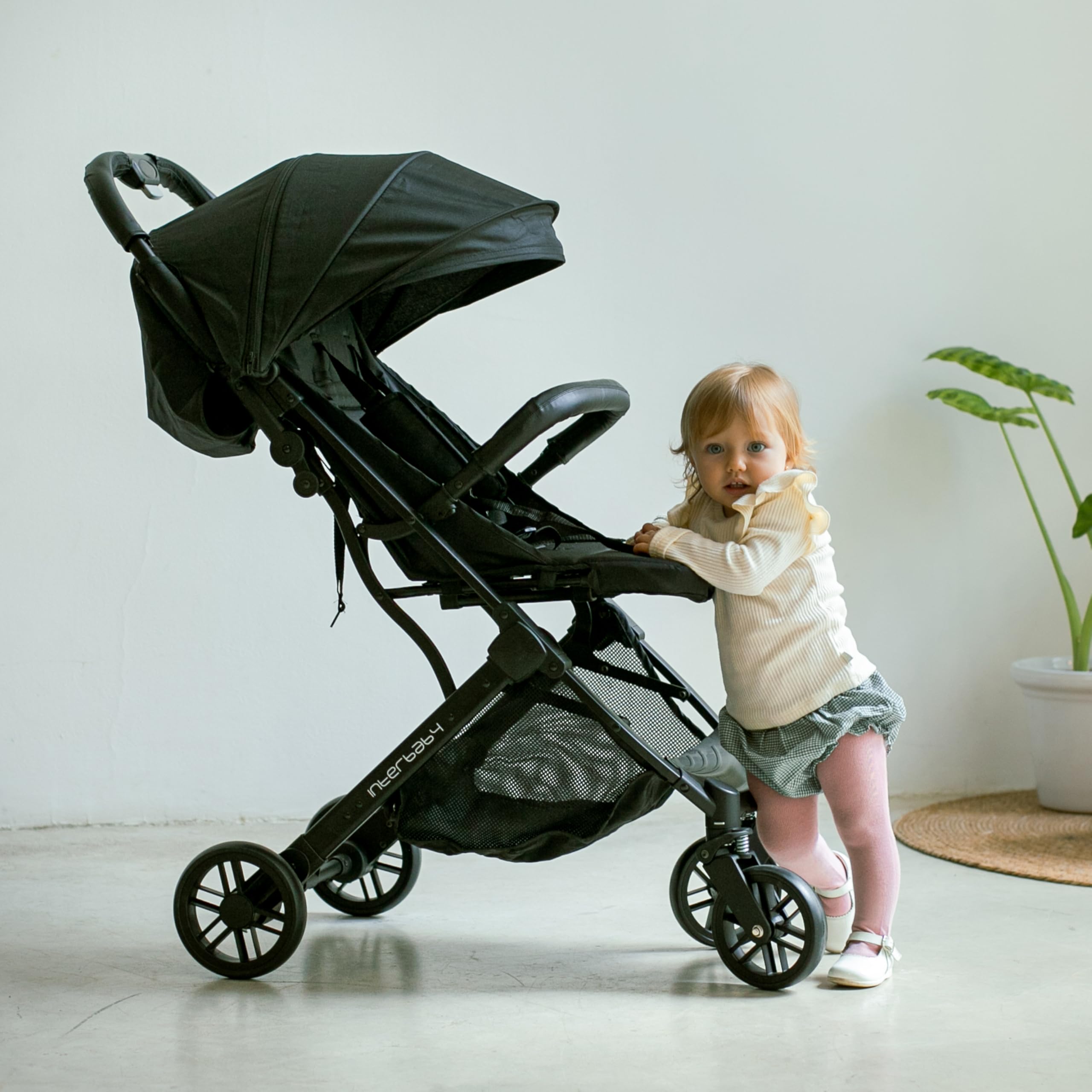 Interbaby Passeggino Leggero Compatto e Ultraleggero | Passeggino da Viaggio e Aereo Pieghevole, dalla Nascita fino a 22 kg | Chiusura Rapida, Cappottina XXL, Ammortizzatori (Min. Plus Space Rosa)
