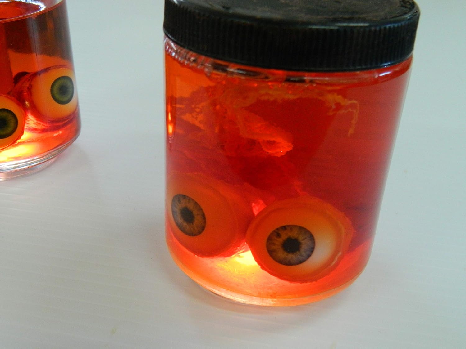 Dead Head Props Halloween Horror Prop Life Size Realistic Specimen Jar of Ripped Out Eyeballs