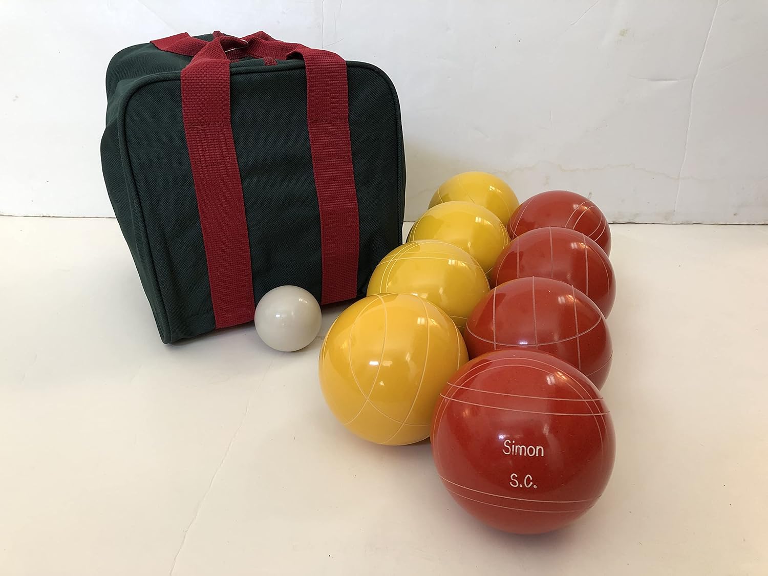 BuyBocceBalls Listing - Made in USA, Premium Quality Engraved Tournament Bocce Set, 998 Grams (2 lbs. 3.2 oz.). Various Bag Colors - 110mm Yellow and Rustic Orange Balls, Nylon Bag