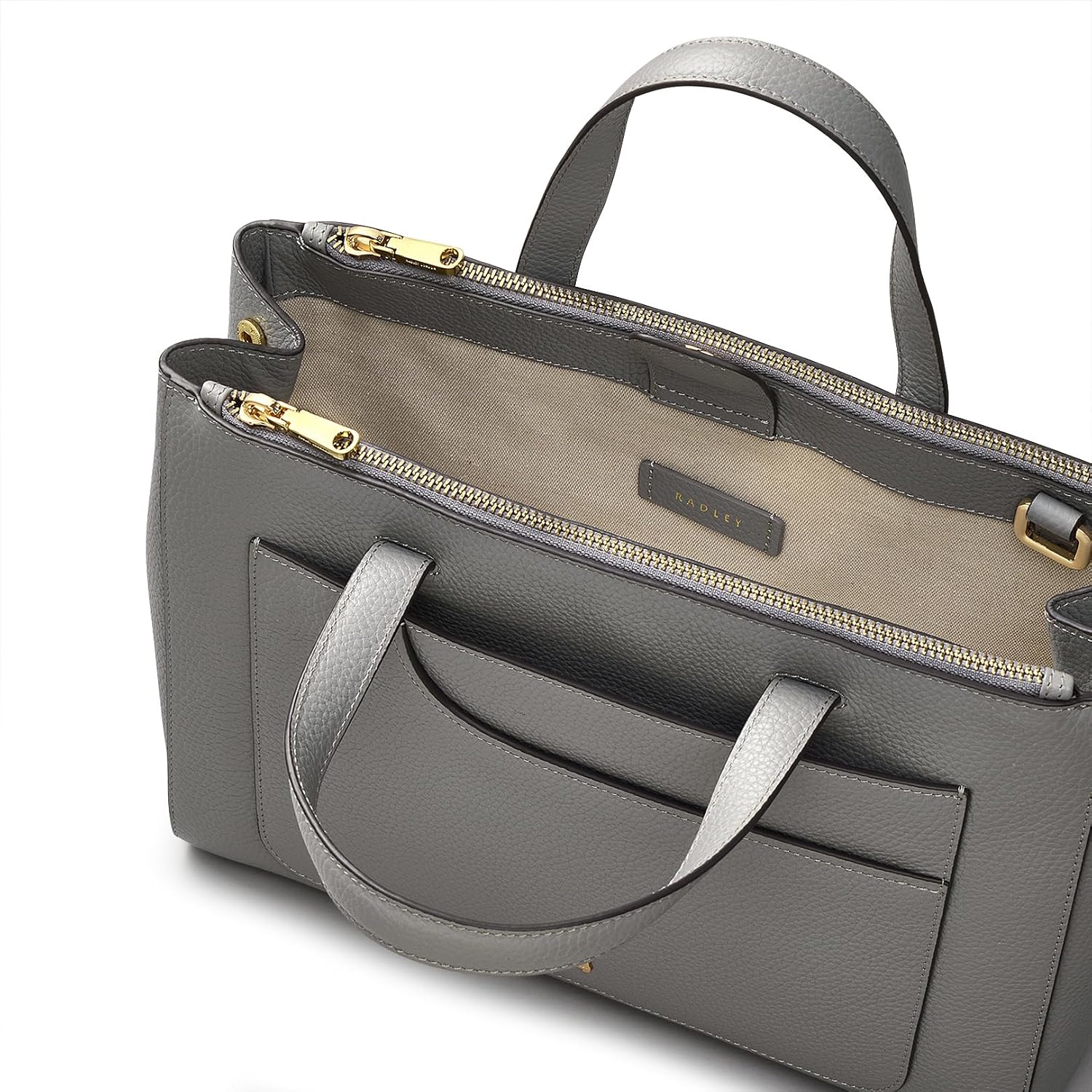Side view of the RADLEY London Pockets Soft 2.0 Satchel Bag, showing the attachment point for the crossbody strap and the texture of the leather.