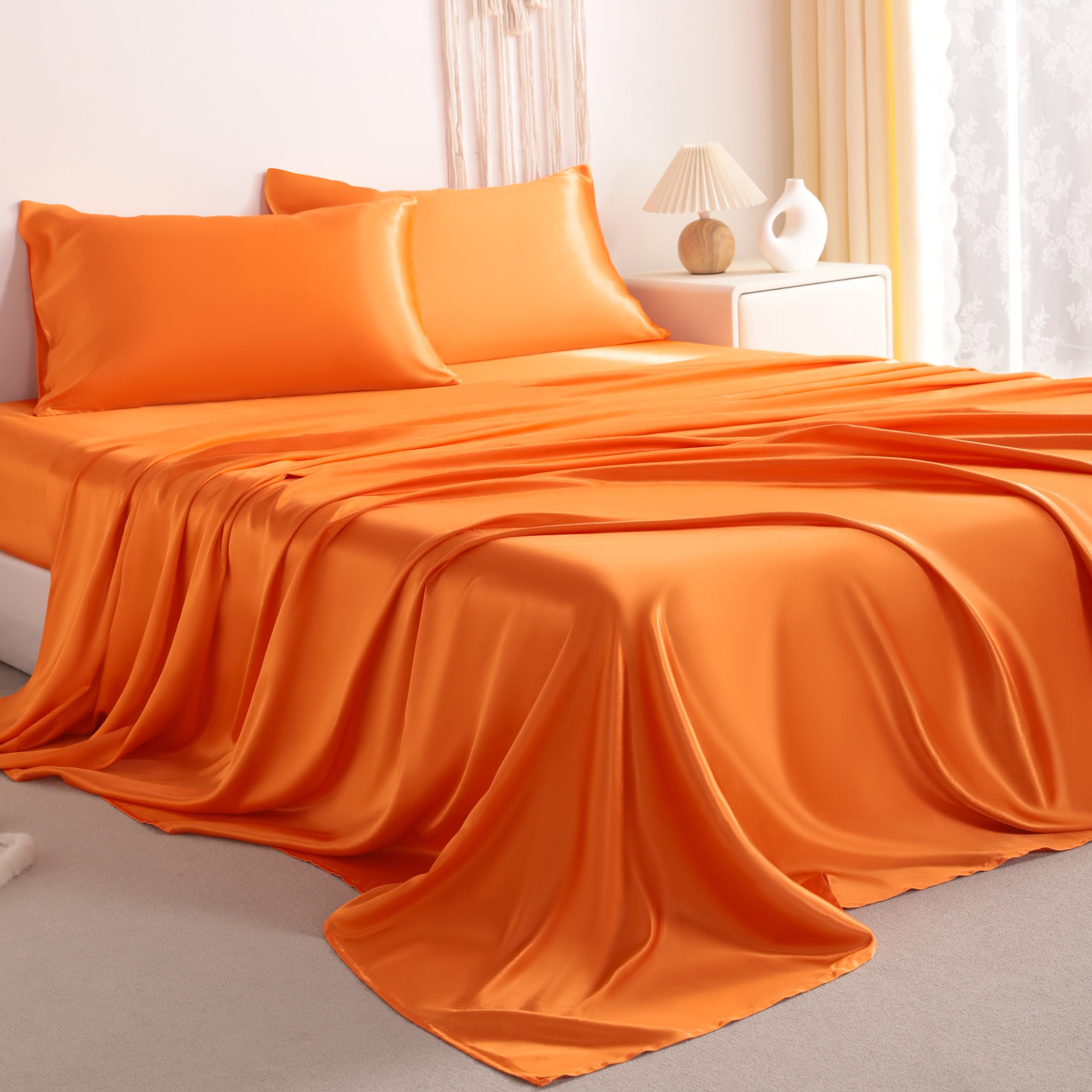 Parure de lit en satin orange d'une douceur absolue et finitions premium