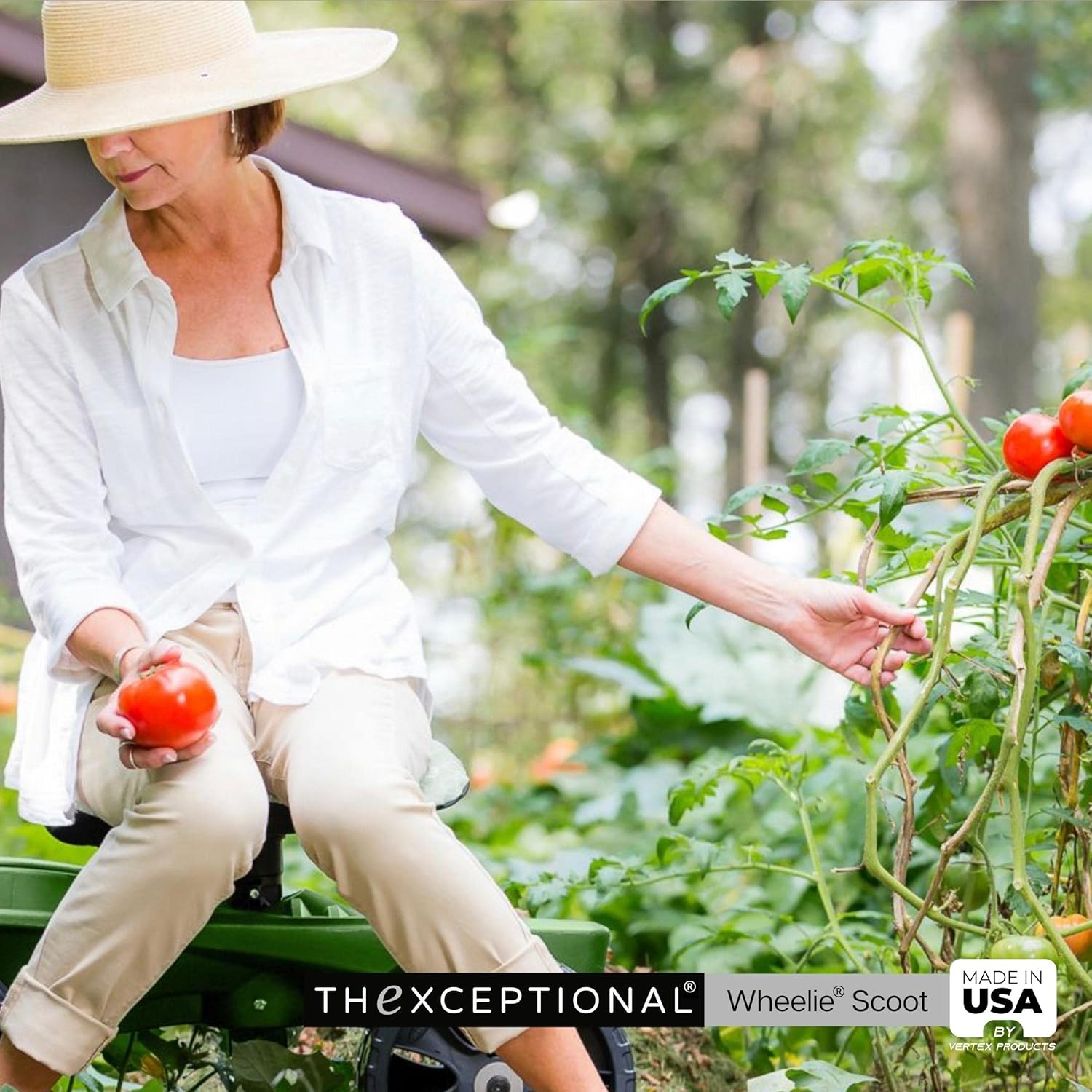 A woman comfortably seated on the Wheelie Scoot EX500, tending to plants in a garden.