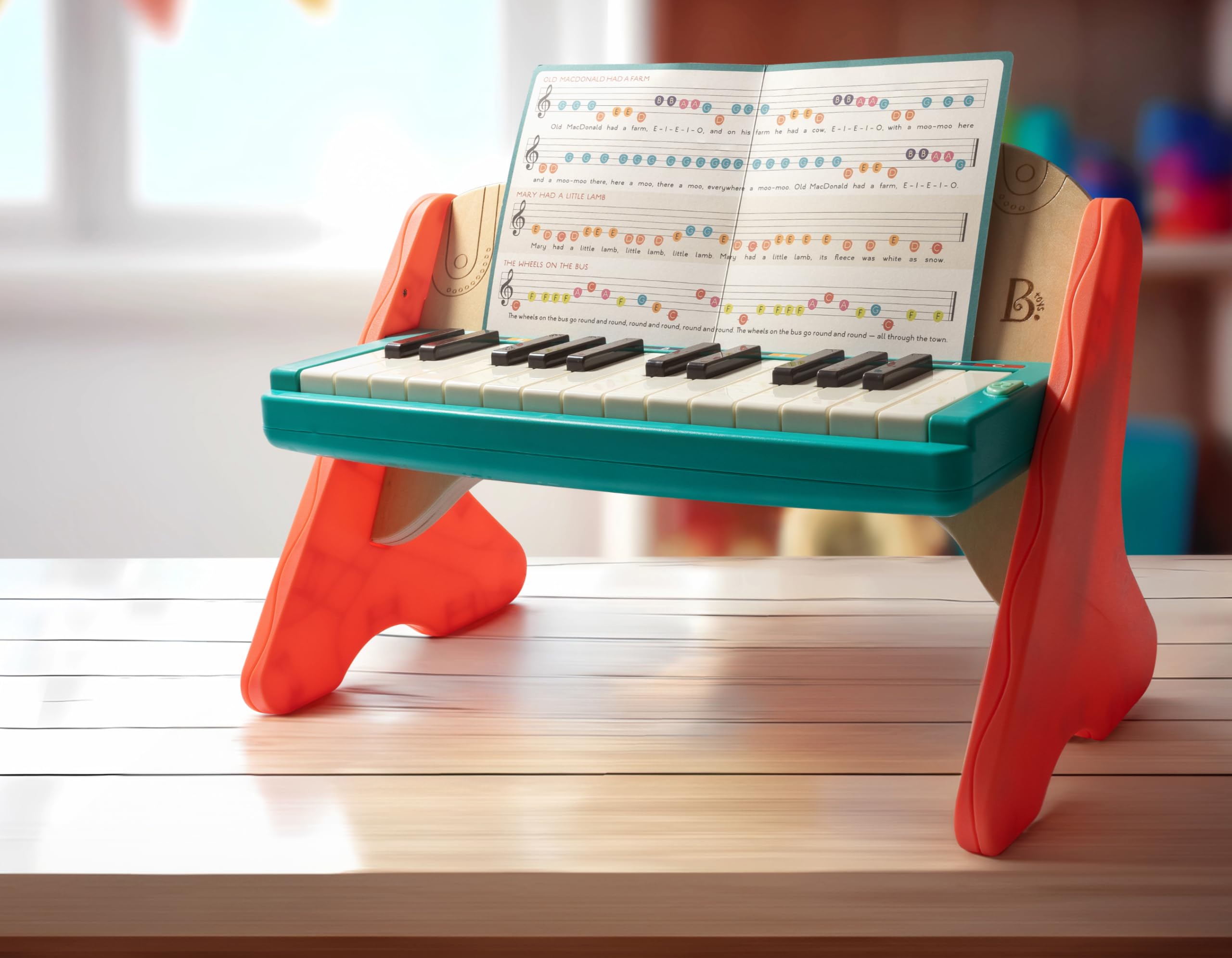 B. toys Jouet en Bois Mini Maestro avec Touches colorées, Plan, Lot de 1 | Livret de 6 compositions classiques inclus pour l’éveil musical et la créativité, Plan, Lot de 1, 3 ans et +