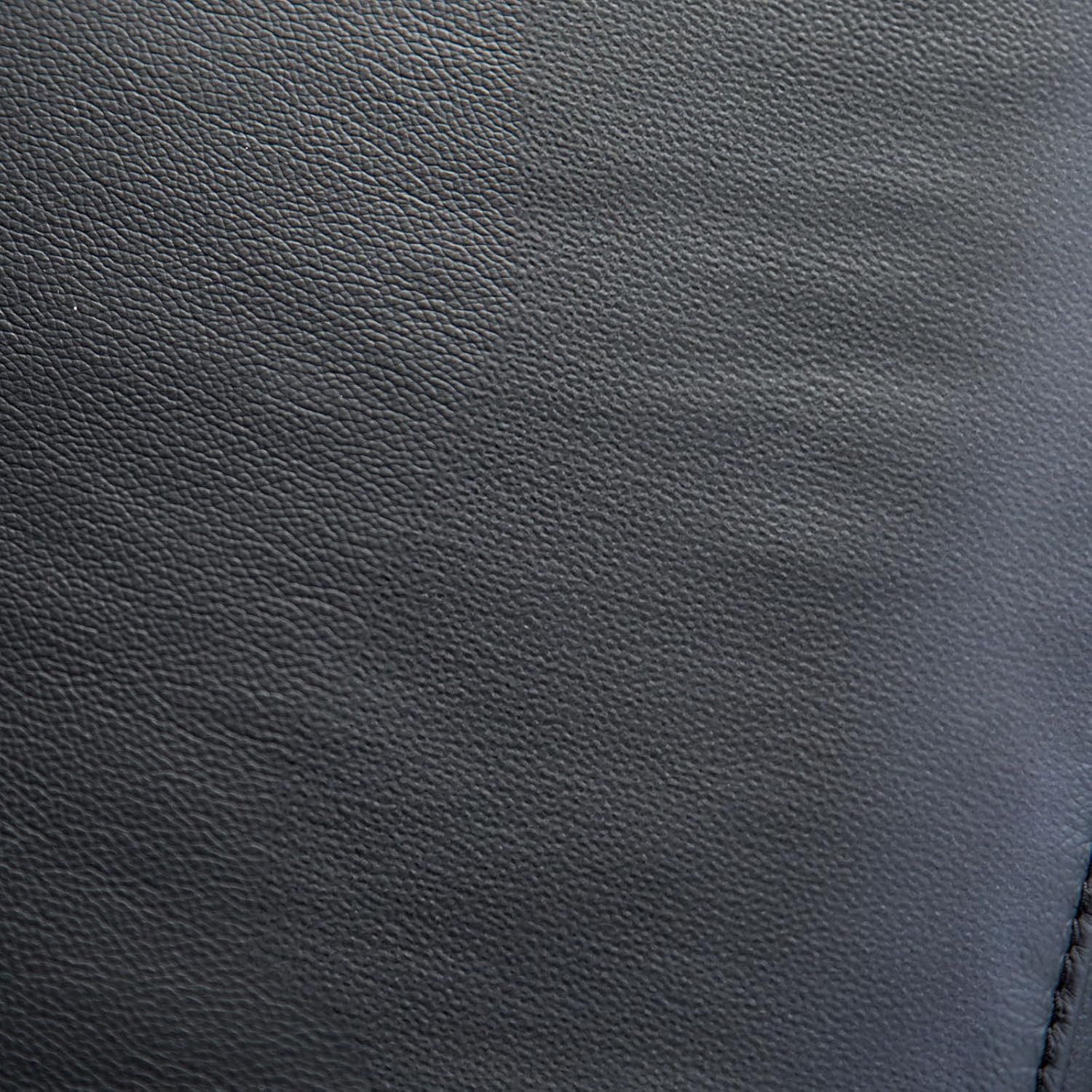 Close-up of the black leather match upholstery texture