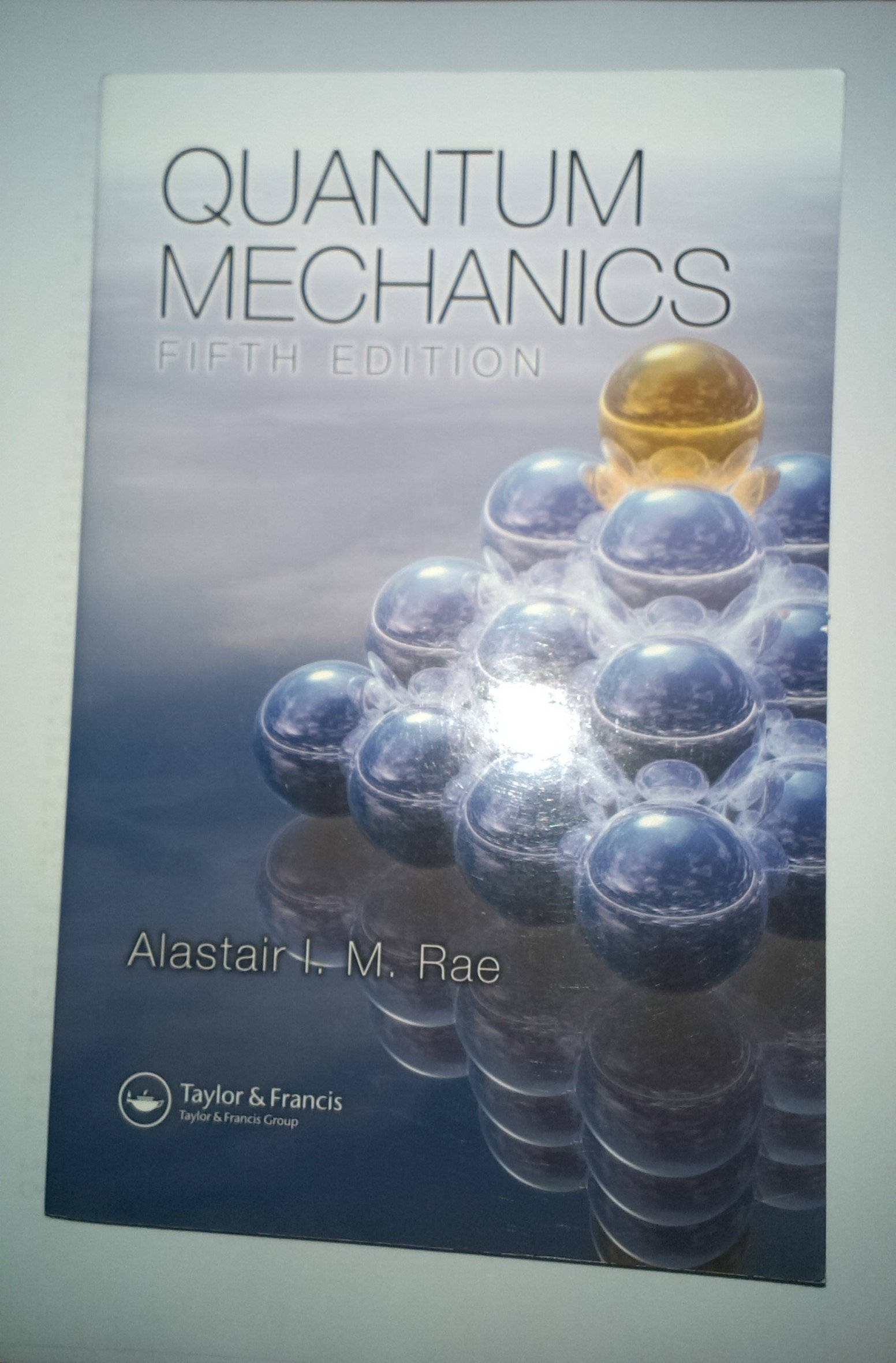 Quantum Mechanics, Fifth Edition