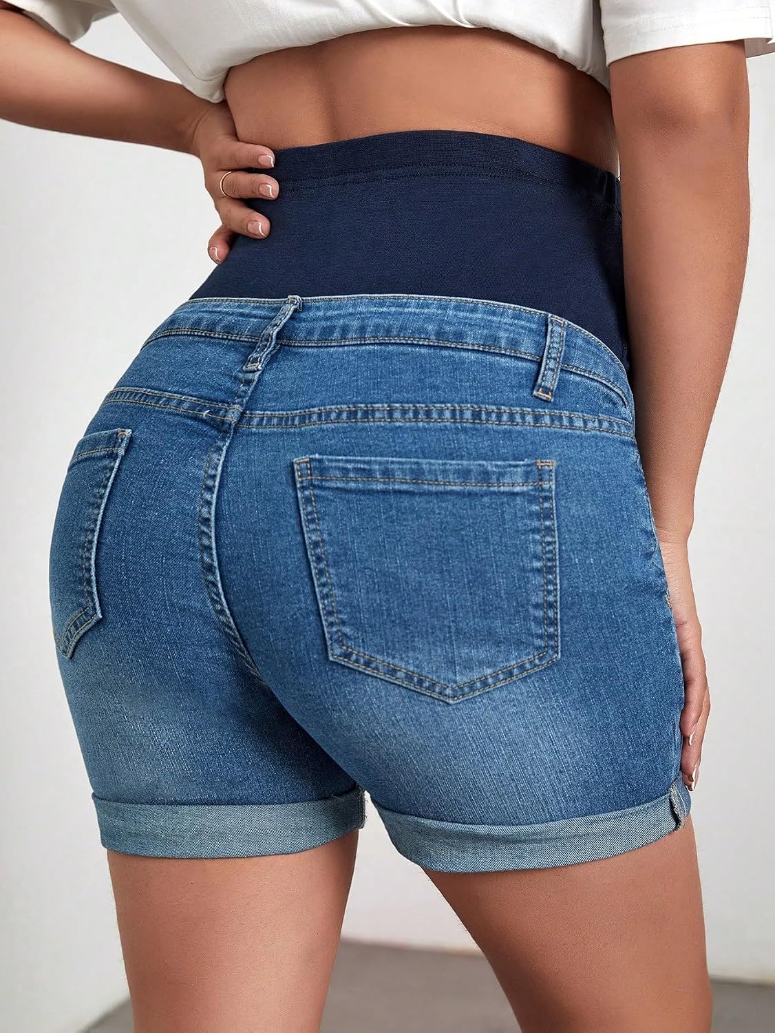 OYOANGLE Women's Maternity Jean Shorts Over the Belly Cuffed Hem Stretchy Pregnancy Denim Shorts