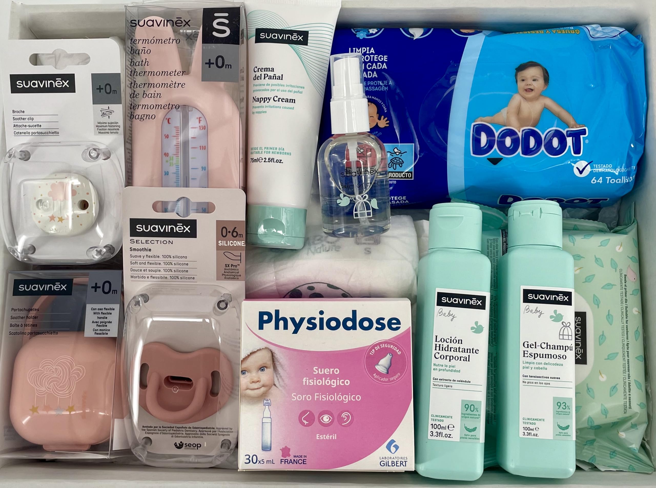 Panier bébé rose | Comprend gel, shampoing, eau de Cologne | Tétine Suavinex, thermomètre, biberon, porte-tétine, broche | 4 couches Taille 2