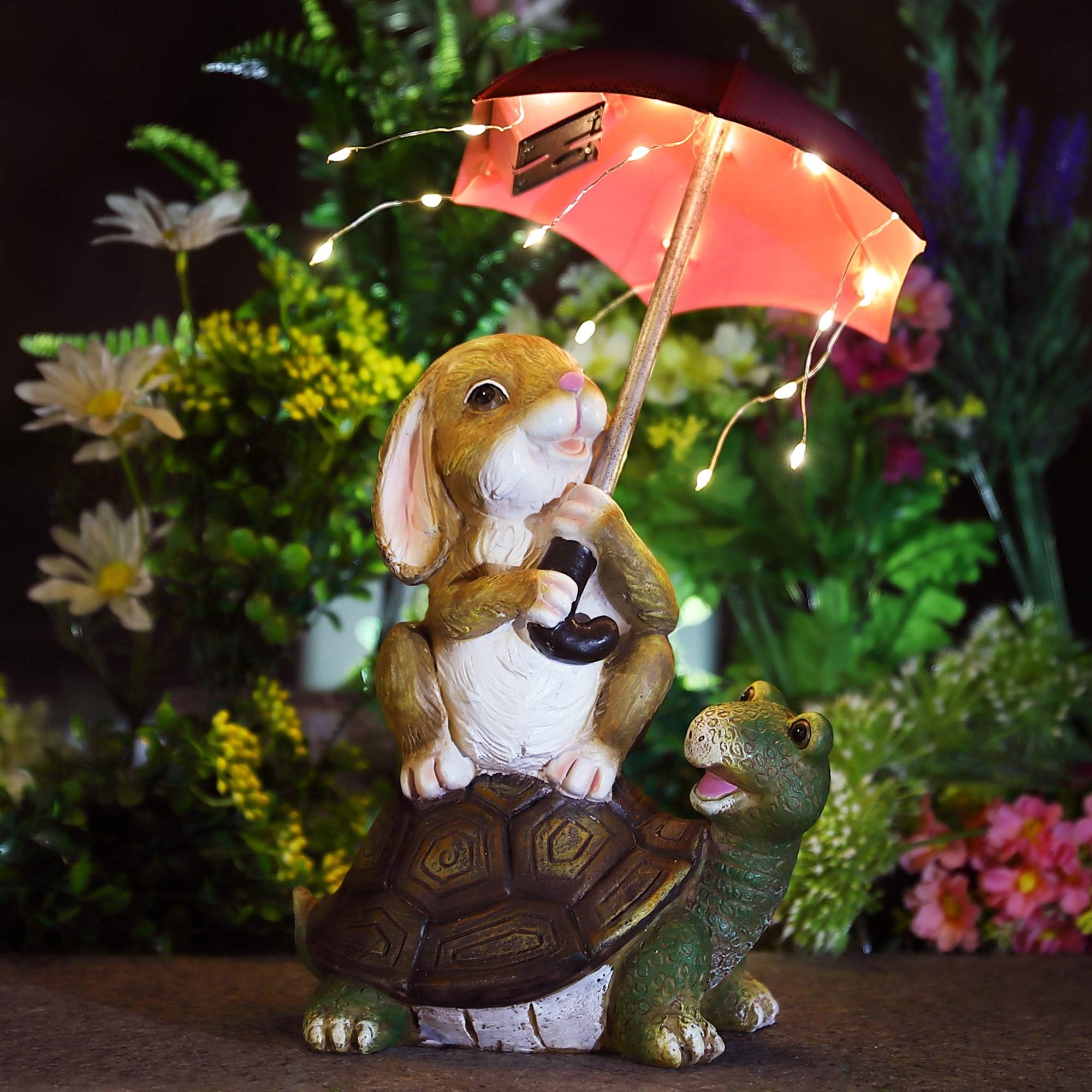 Bunny with Umbrella sitting on Turtle Solar Light
