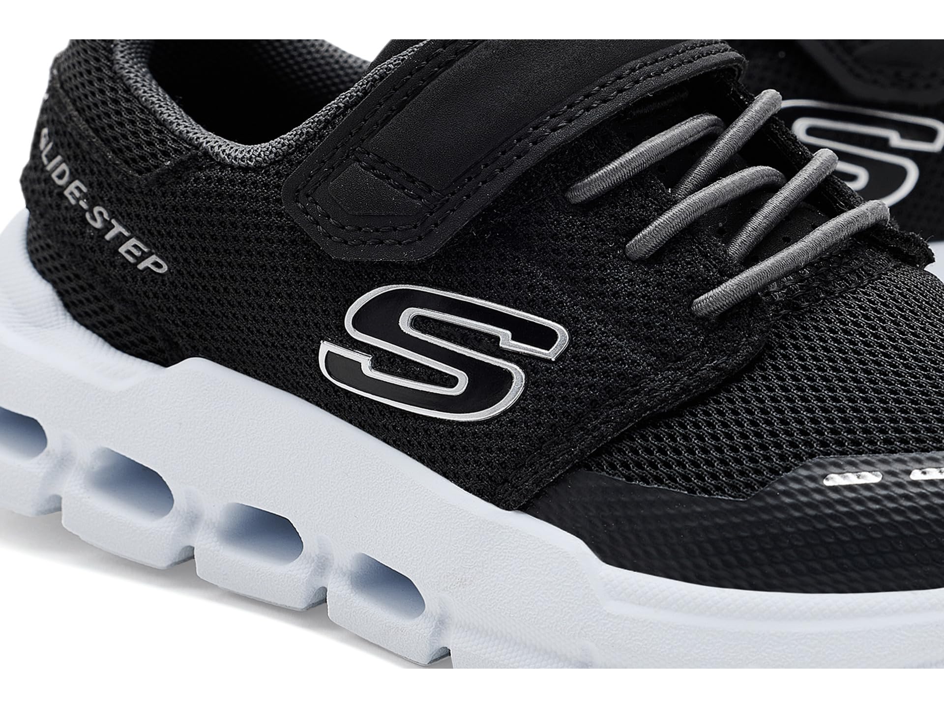 Skechers Buty chłopięce Skechers Glide-Step FlowSneaker, czarno-biały, 36 EU