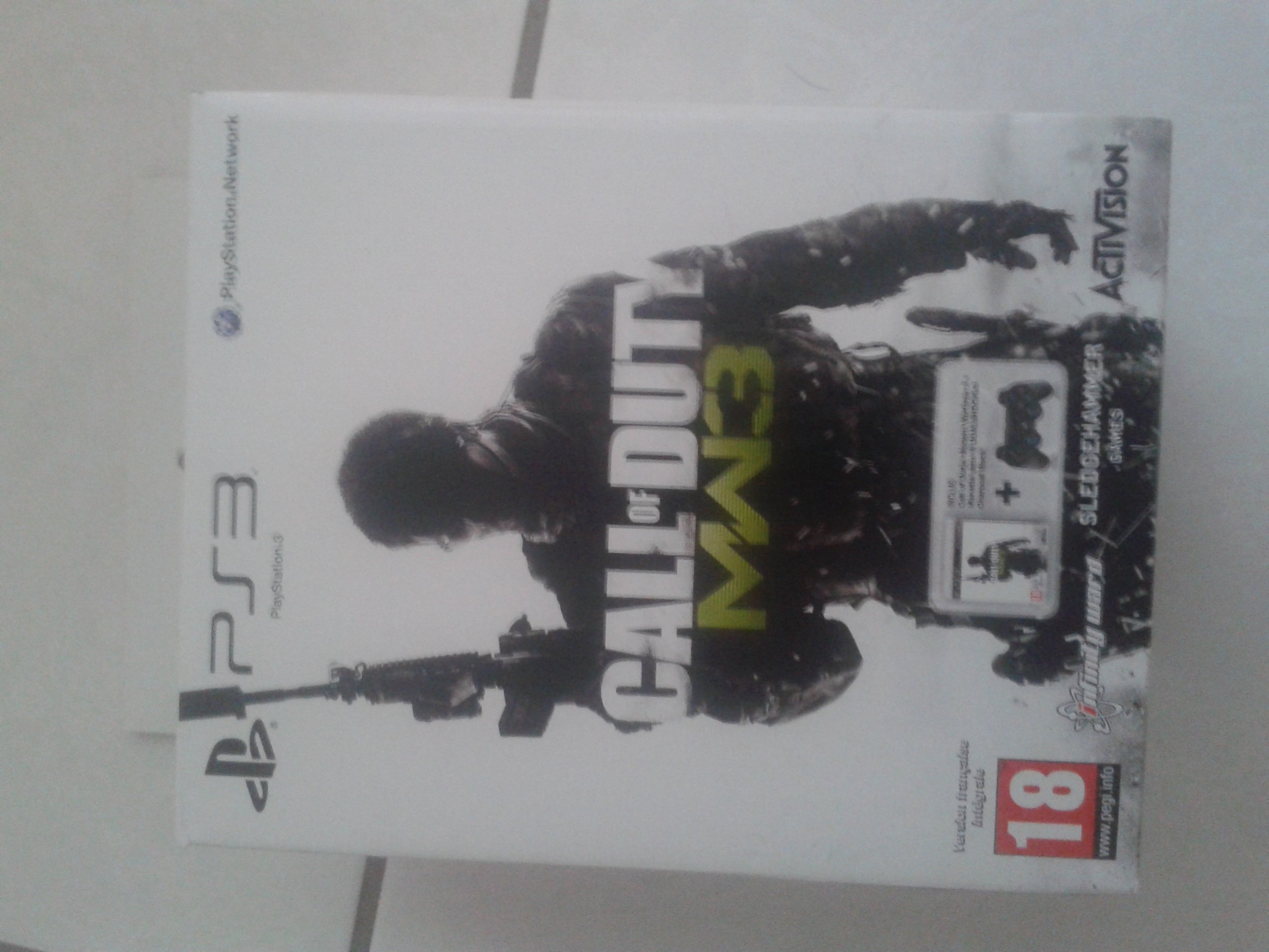 Manette PS3 Dual Shock 3 - noire + Call of Duty Modern Warfare 3