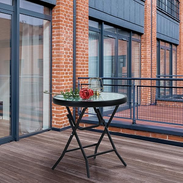 The PHI VILLA Folding Side Table in turquoise offers a compact and stylish solution for patios and balconies.