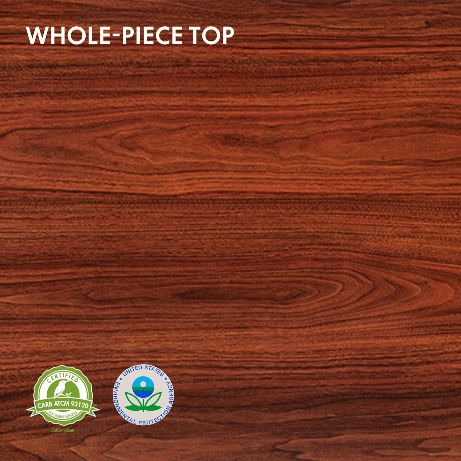 Close-up of the one-piece mahogany desktop with FSC certification logo