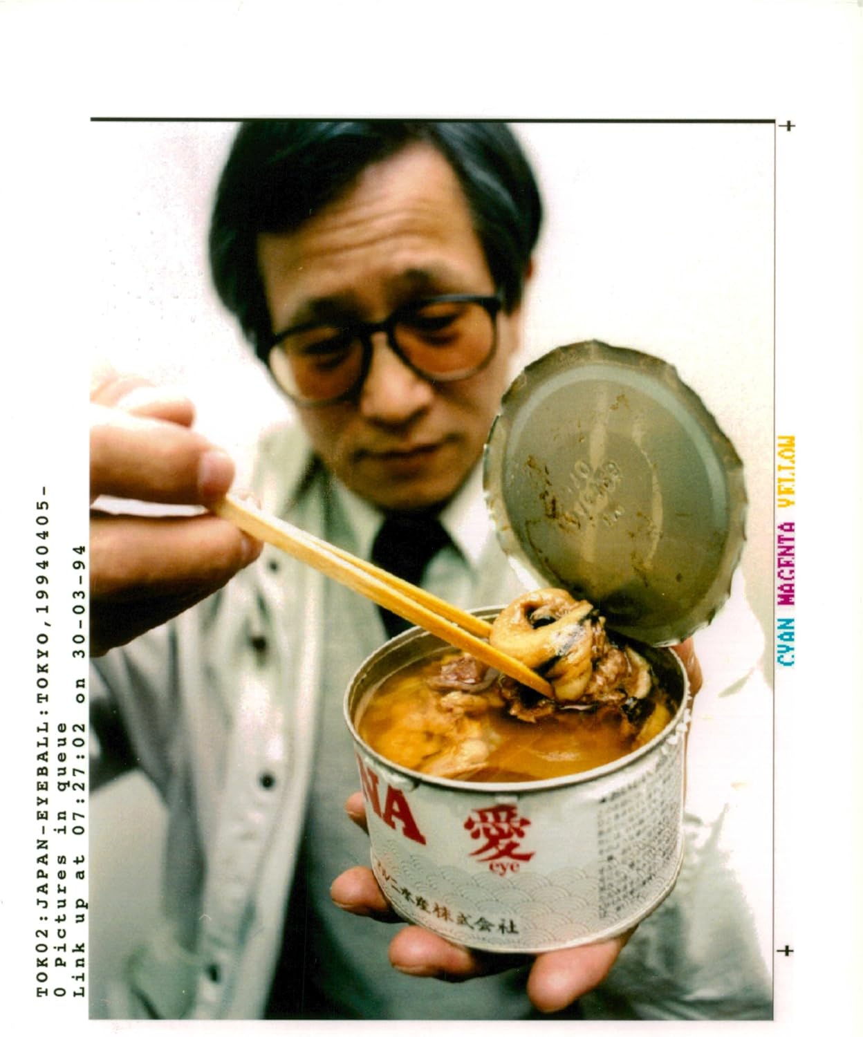 Vintage photo of A Tokyo man samples tuna eyeballs Home