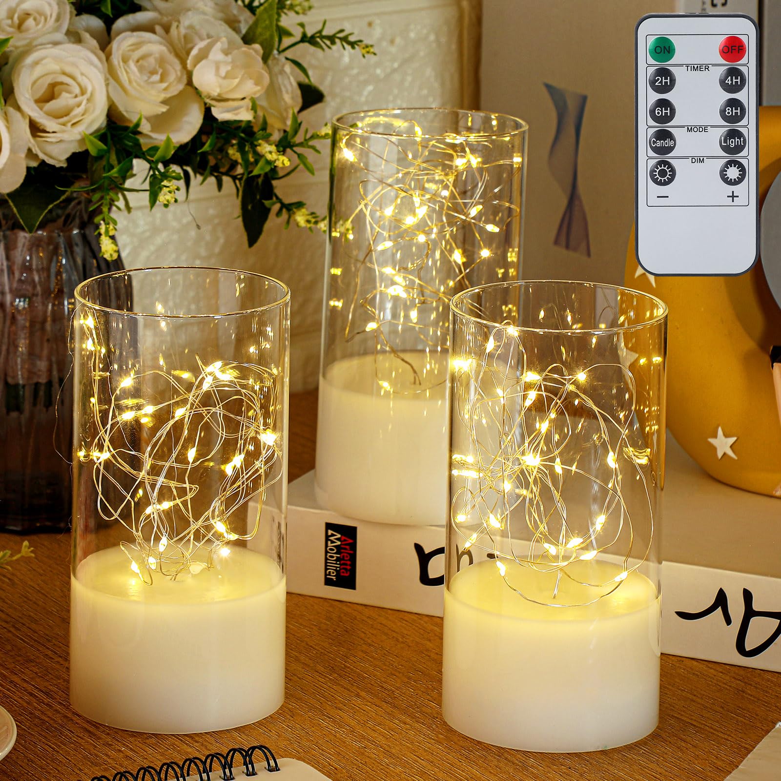 Photo 1 of 3 Pcs 2.95 x 5.91 Inch Flickering Flameless Candles with Remote Embedded Twinkle String Lights in A Cylinder Battery Pillar White LED Candles with Timer for Wedding Home, 8 Mode Lights (Clear) Clear 2.95 x 5.91 Inch