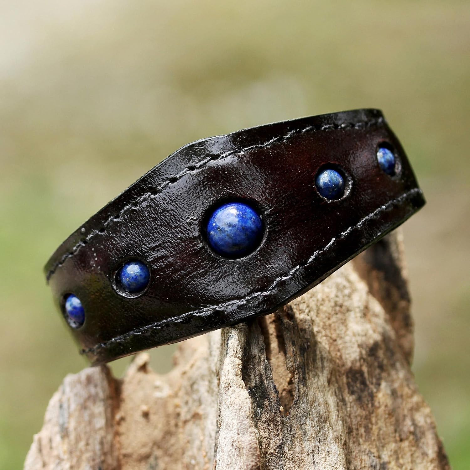 NOVICA Artisan Handmade Lapis Lazuli Cuff Bracelet in Leather Thailand [18 in L 1 mm W Pendant(s) 0.8 in L x 0.9 in W Extender 1 in L] ' Power Blue'