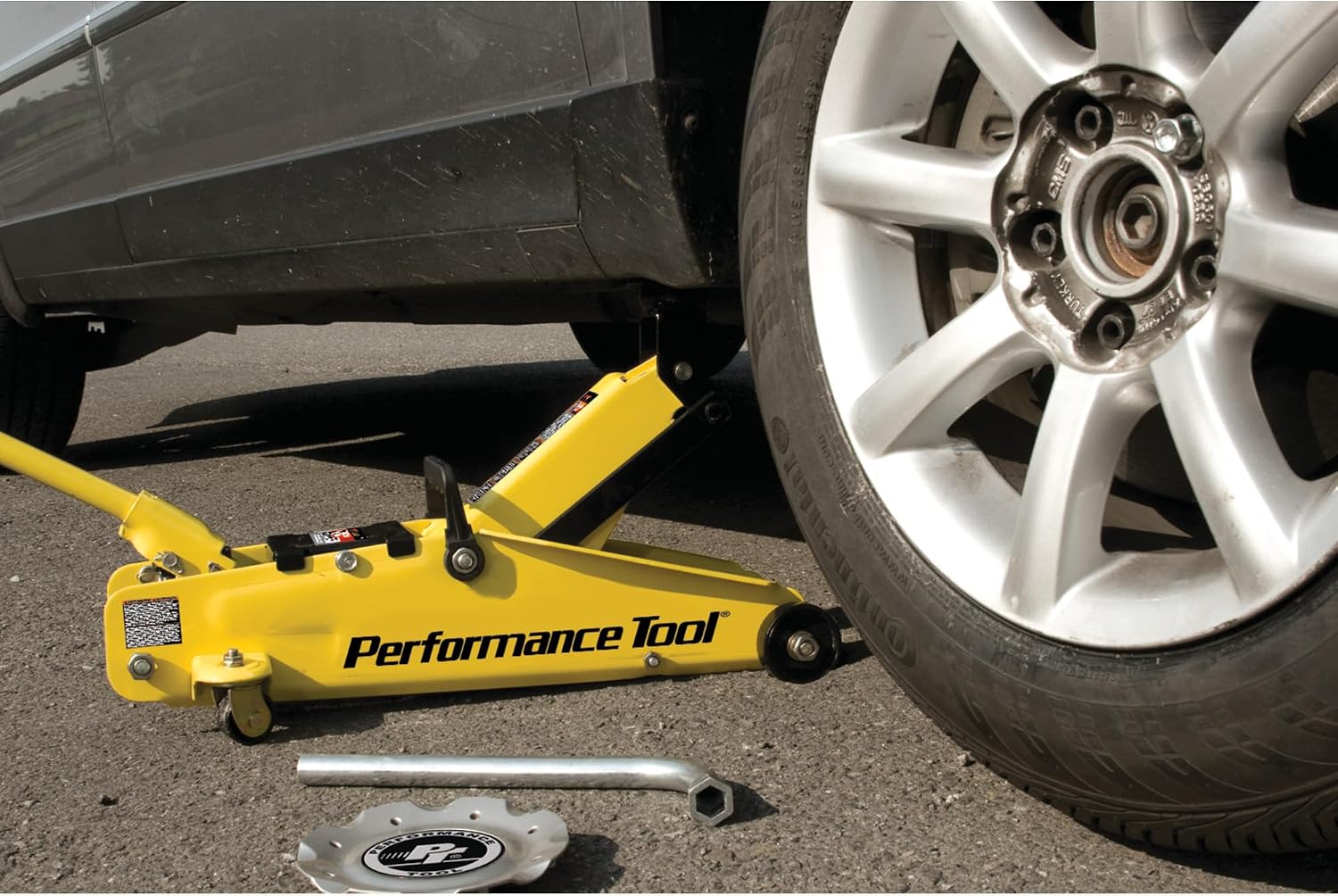 Performance Tool W1640 2-1/2 Ton Garage Jack, (5,000 lbs.) 5-15.5-Inch Lift, Swivel Casters, For Cars/Trucks