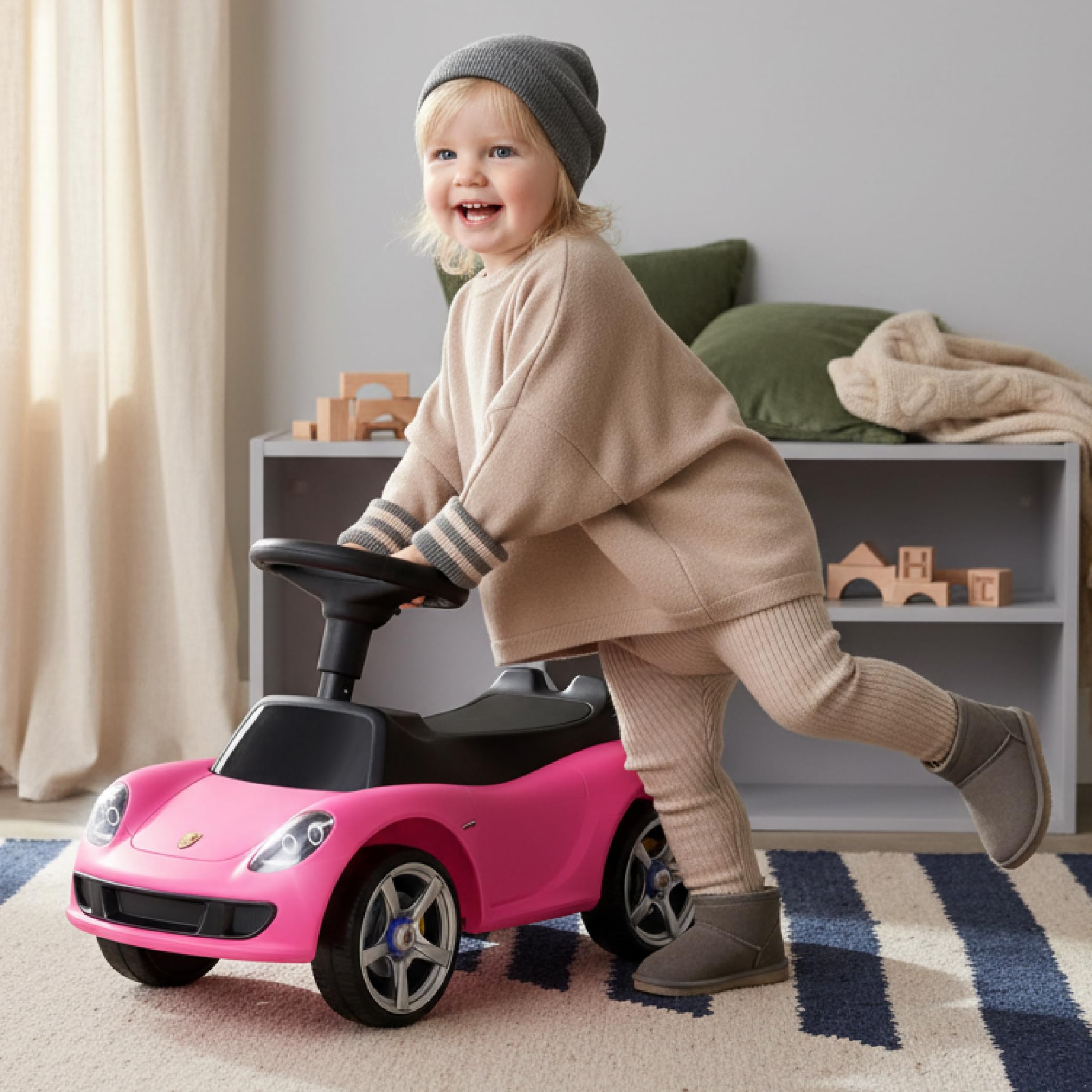 sun baby Rutschauto ab 18 Monaten – Porsche Carrera GT – Lenkrad mit Knöpfen, Scheinwerfer, realistische Aufkleber, bis 30 kg, Rosa
