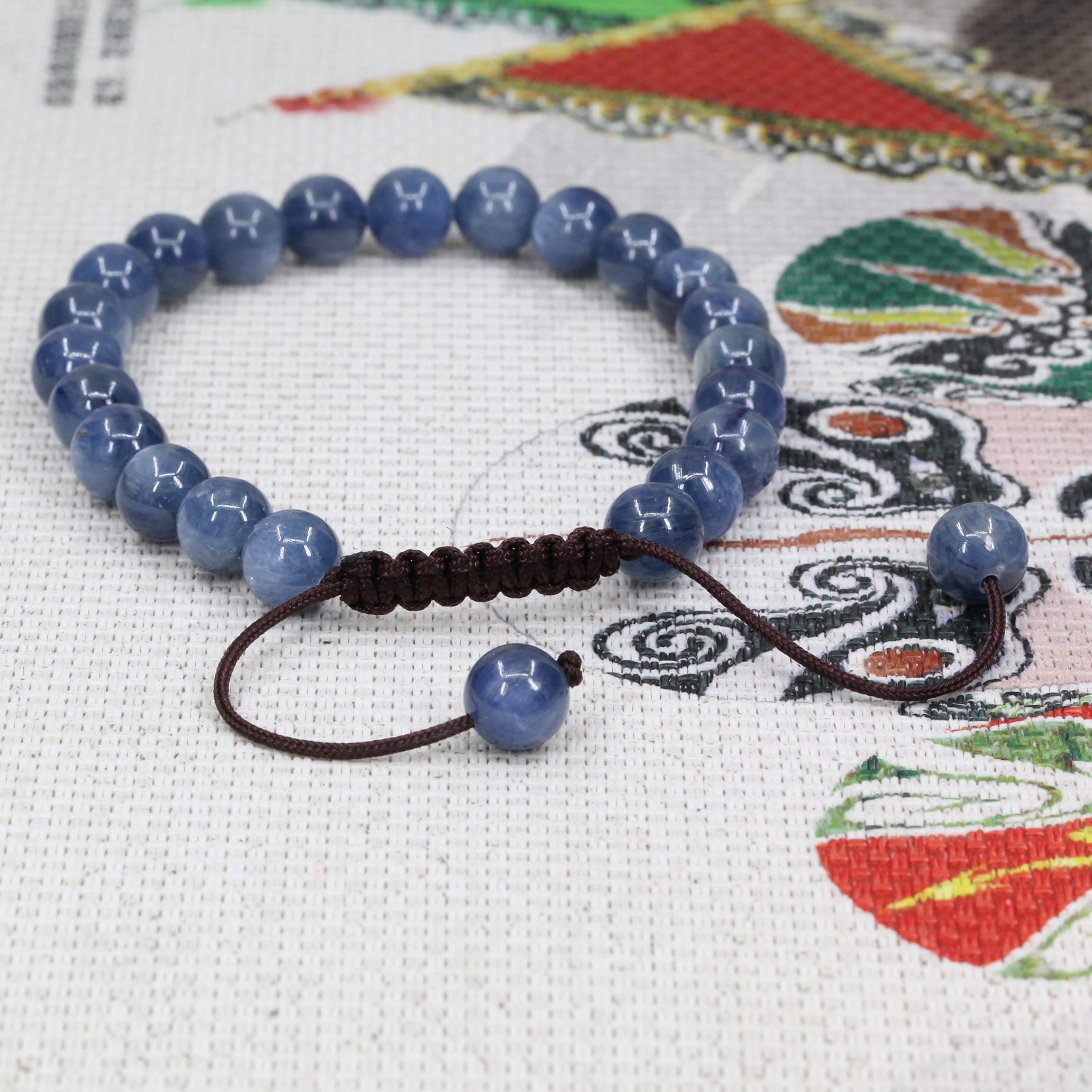 Pulseras unisex con cuentas redondas de cristal de 8 mm, ajustables, trenzadas, con borlas de macramé
