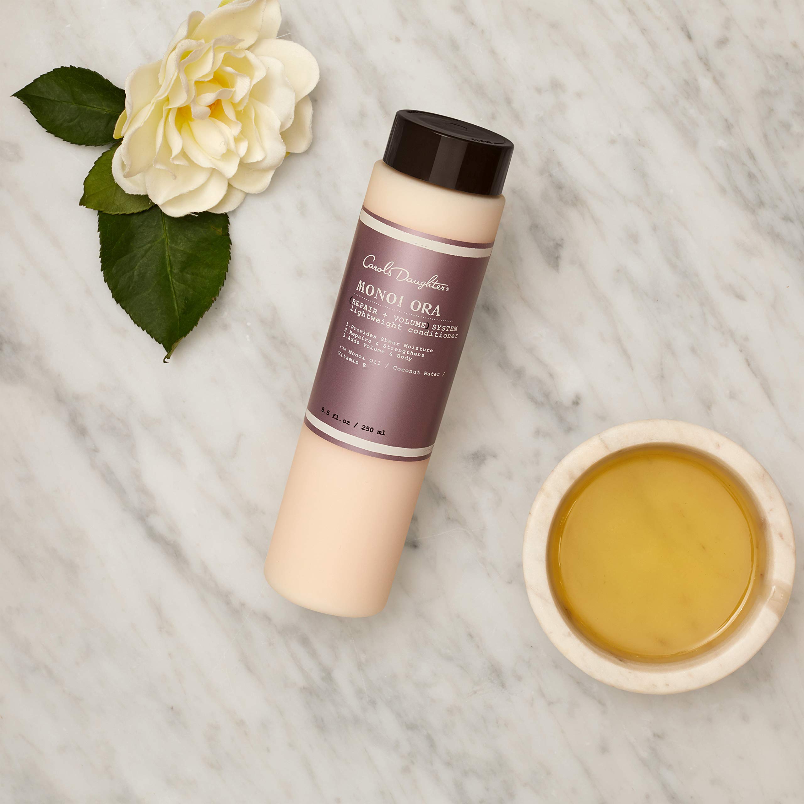 Carol S DAUGHTER Monoi Ora + volume système Lightweight Après-shampoing réparateur 250 ml