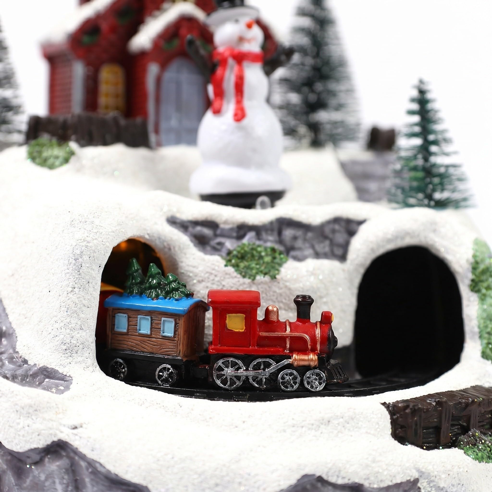 Operitacx Casa de Pueblo navideño con Tren en Movimiento, Figura de muñeco de Nieve iluminada con villancicos, construcción Coleccionable de Invierno para decoración del hogar, Centro de Mesa.