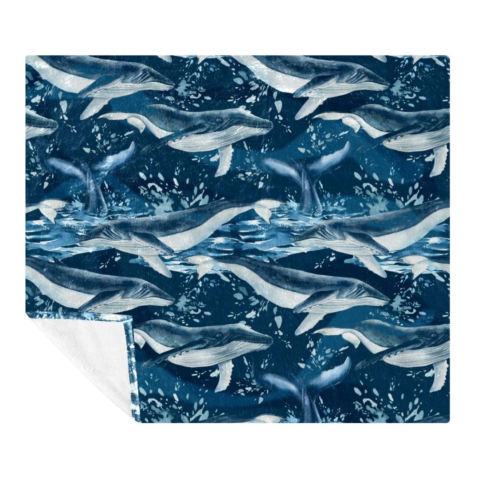 Couverture bleue baleine douce et légère contre le froid du canapé