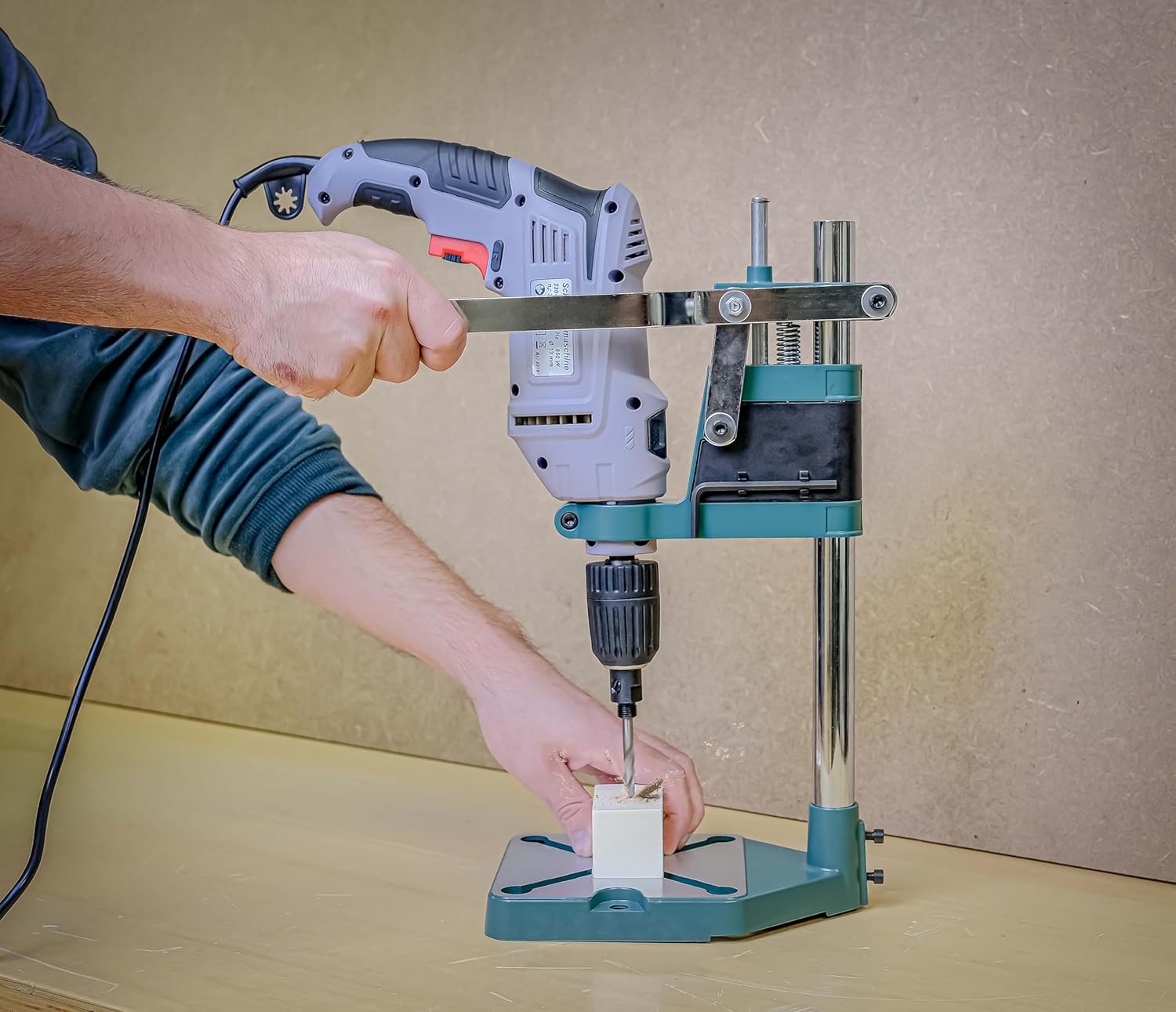 Power drill attached to Brueder Mannesmann M 1255-420 Drill Stand