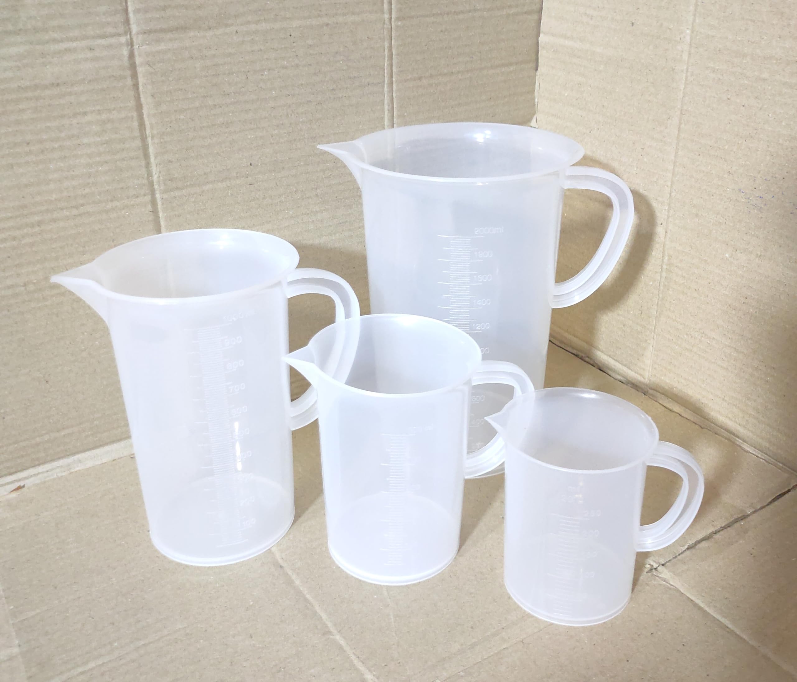 Plastic Measuring Jug 2000ml, 1000ml, 500ml, 250ml, and 2PCS Plastic funnels for Kitchen use funnels Set All Purpose Funnels 4 inch and 2 inches.