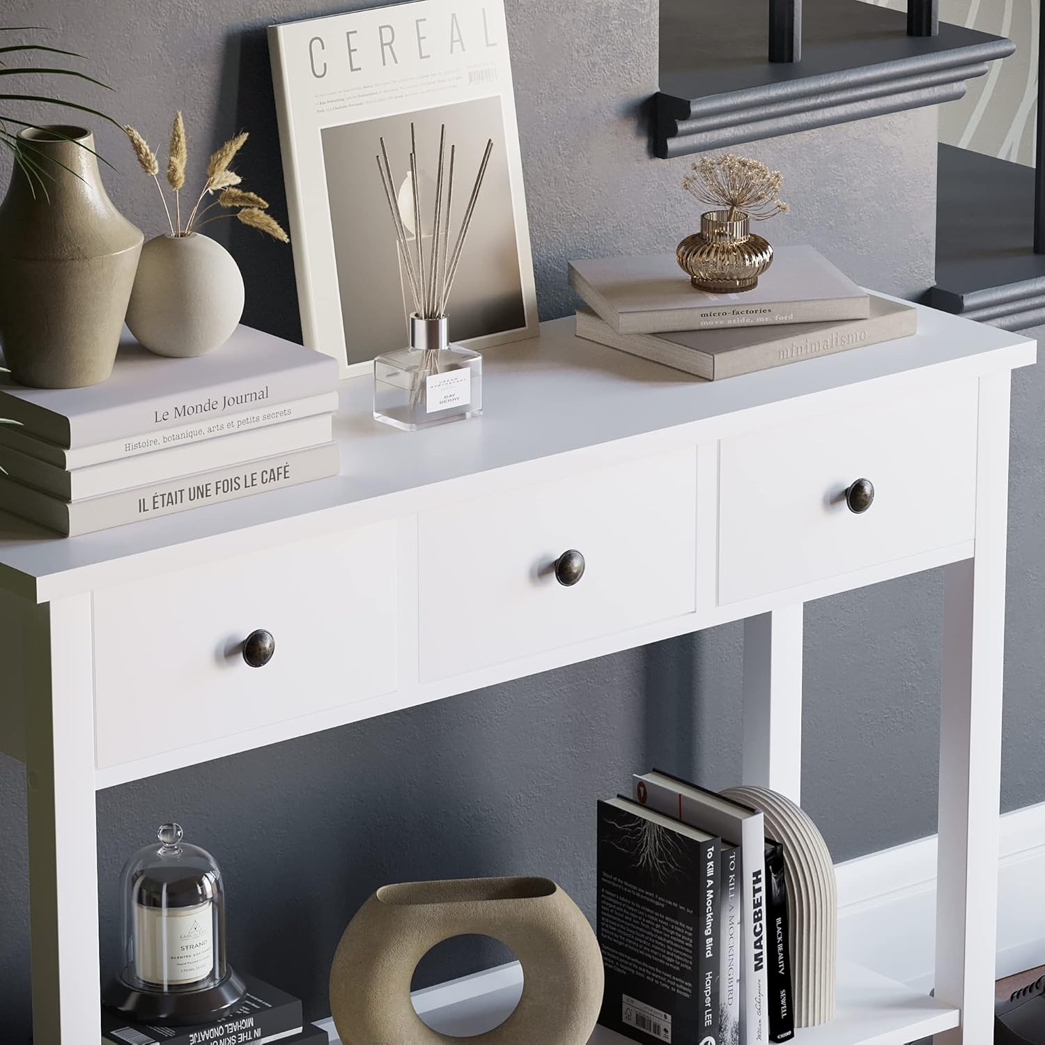 Close-up of the top surface of the Vida Designs Windsor Console Table with decorative items