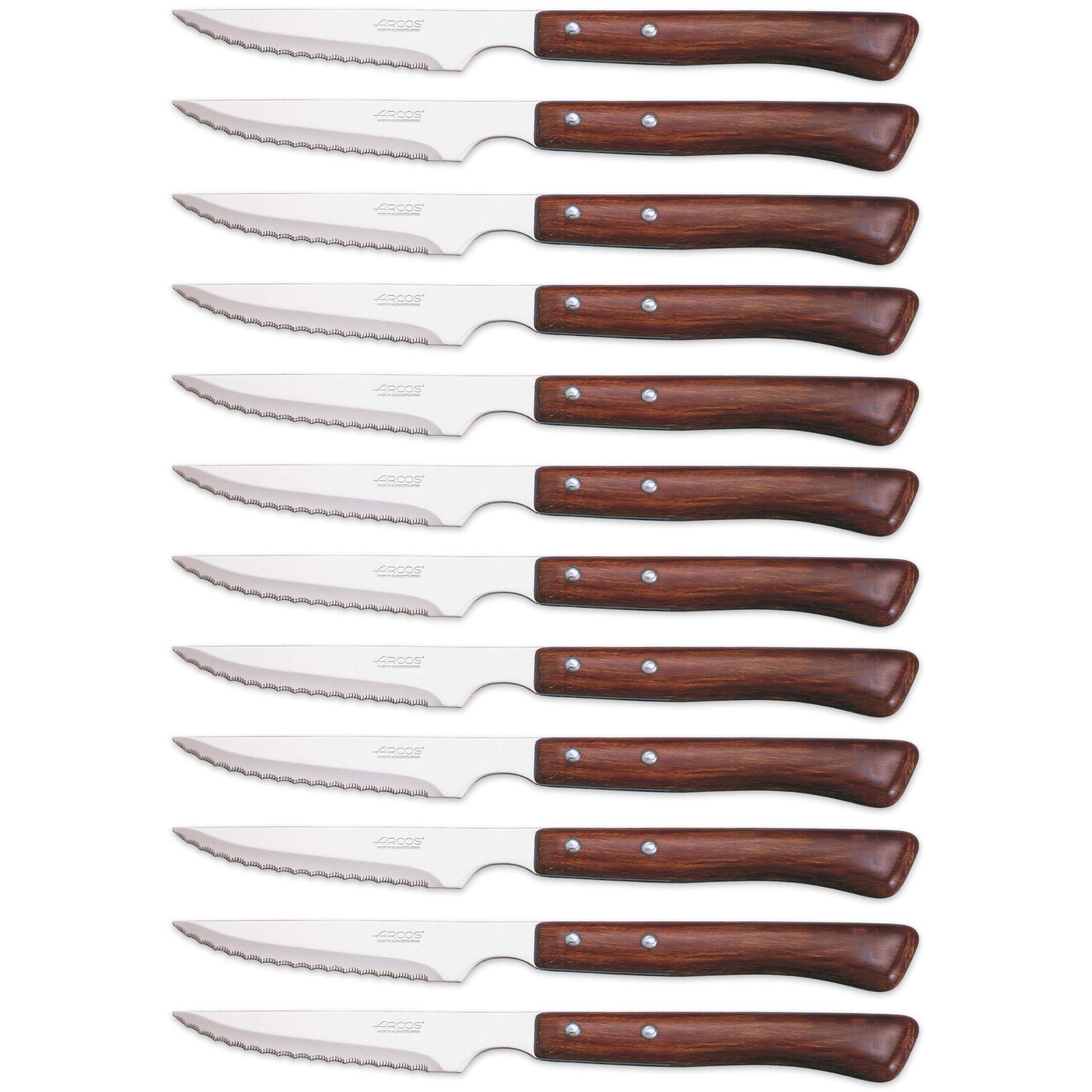 Arcos Serie Cuchillos de Mesa Caja 12 uds Cuchillo Chuletero, Hoja Serrada de Acero Inoxidable NITRUM de 110 mm, Mango Madera comprimida Color marrón (12 UDS)