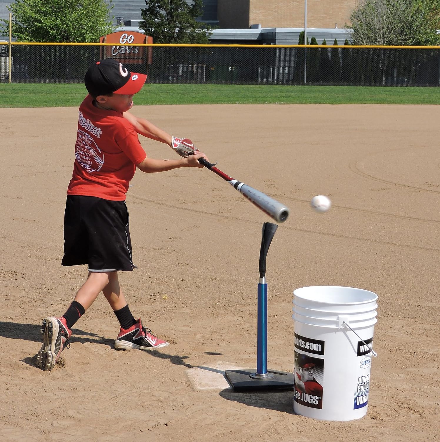 Young baseball player hitting off Jugs T-Pro tee
