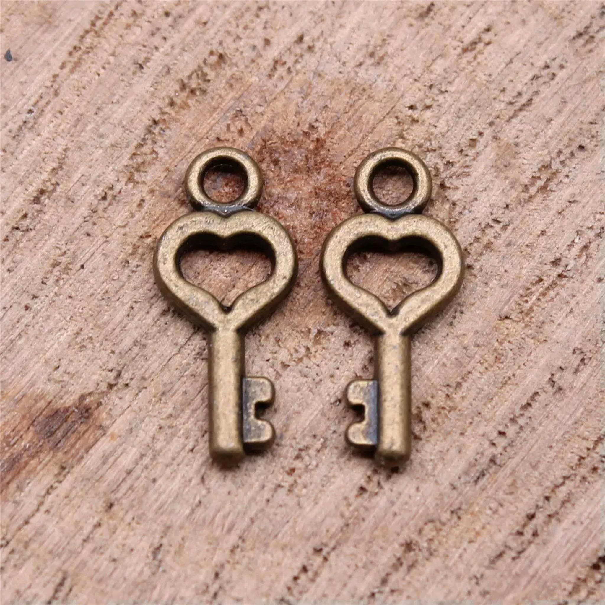 520 Piezas de Llave chapada en Bronce de 16 x 7 mm A13480