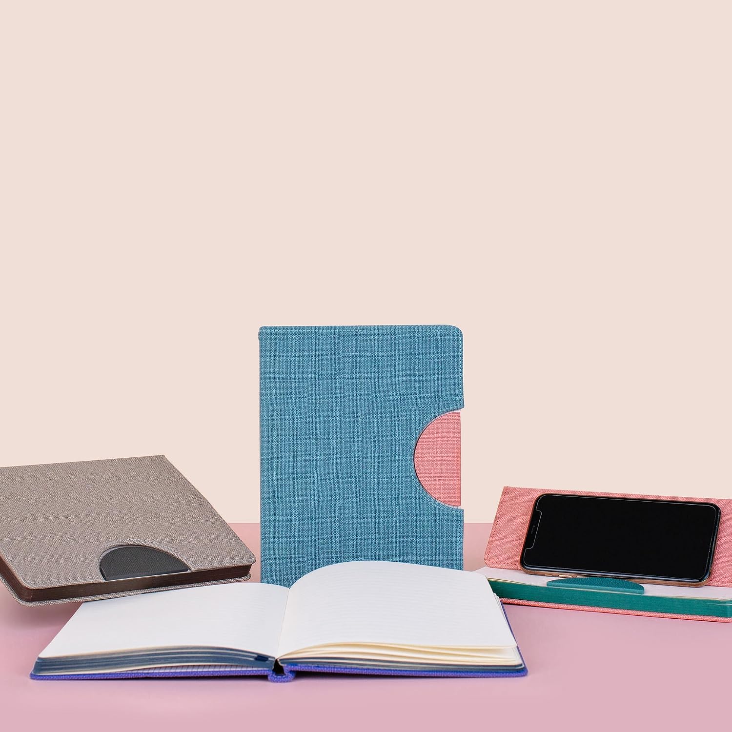 Studio Oh! Dalton Cell Phone Stand Notebook, Coral Pink Hardcover Lined Journal with Built-In Foldable Phone Holder for Desk or Travel, Grosgrain Ribbon Bookmark, 192 Pages, 100 GSM Paper, 6 x 7.87" image 4