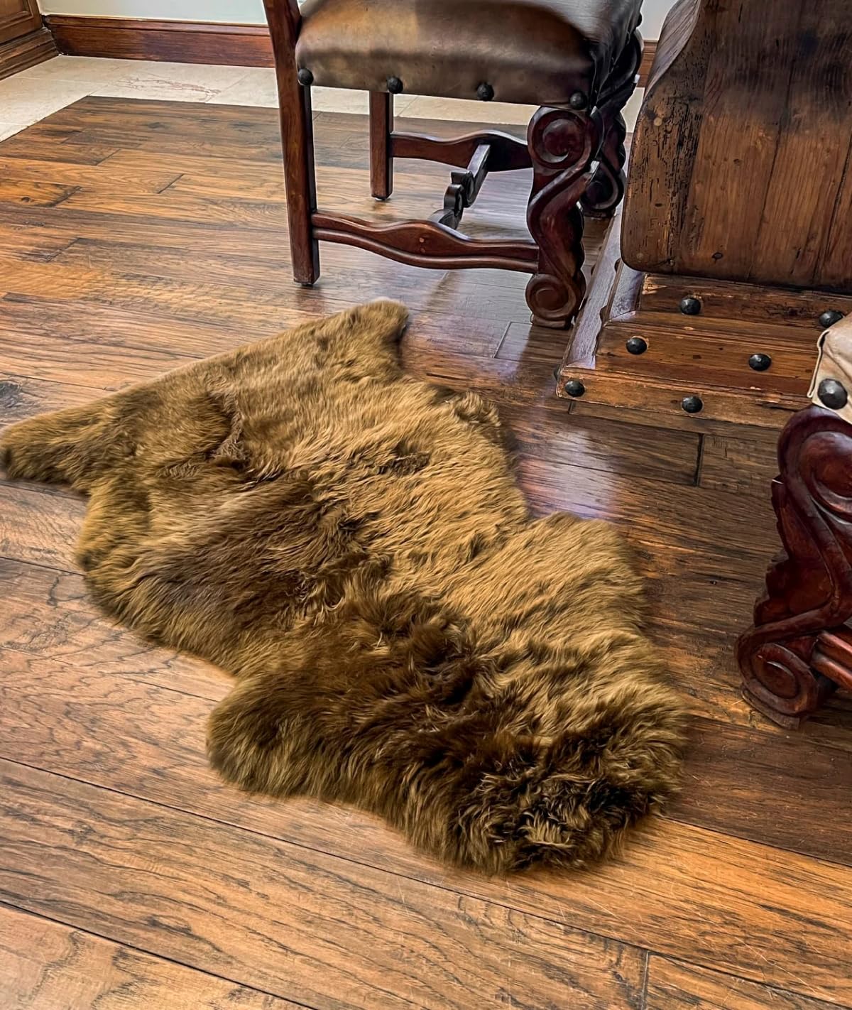 Cowhides Direct Authentic Sheepskin Rug - Black Fur Rug for Bedrooms, Chair Throws & More - Fluffy & Soft New Zealand Sheepskin Rugs (2'x3')