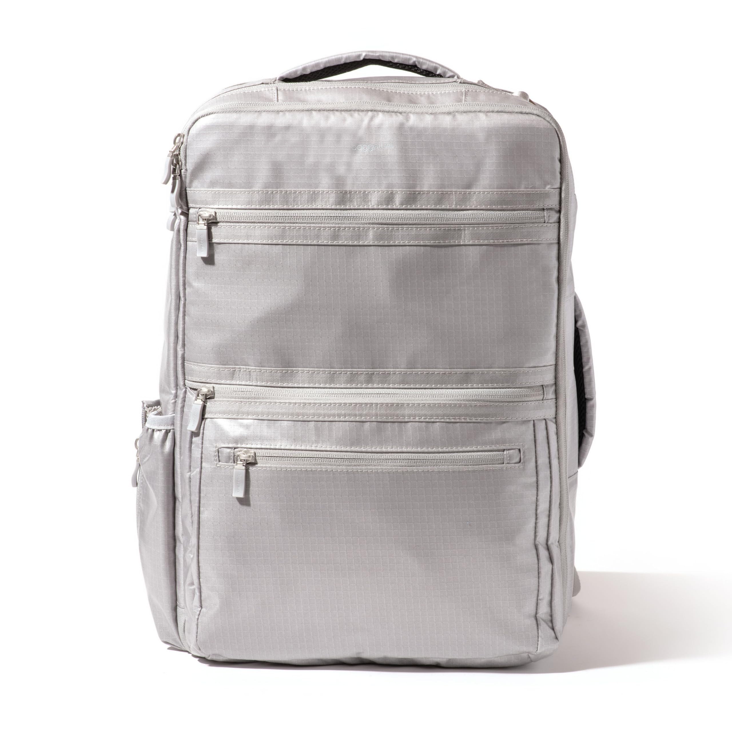 baggallini modern convertible travel backpack fits up to 16” laptop Expandable side pocket zips flat for slim profile or expands to accommodate large water bottle Interior includes elastic tie Convertible Travel Backpack | Modern