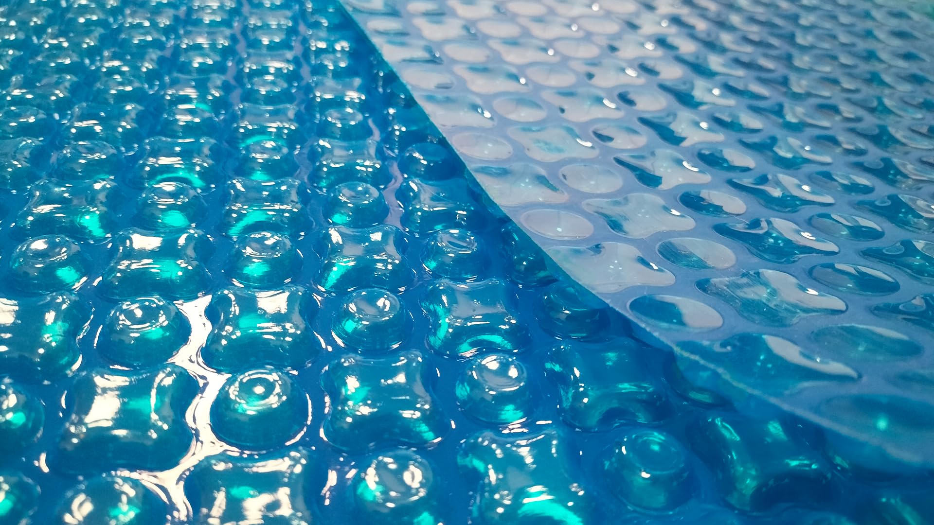 Bâche à Bulles Piscine OXO Light Blue 400 microns - Non Bordée - Confection France - Kit Oeillets + bâchette Protection