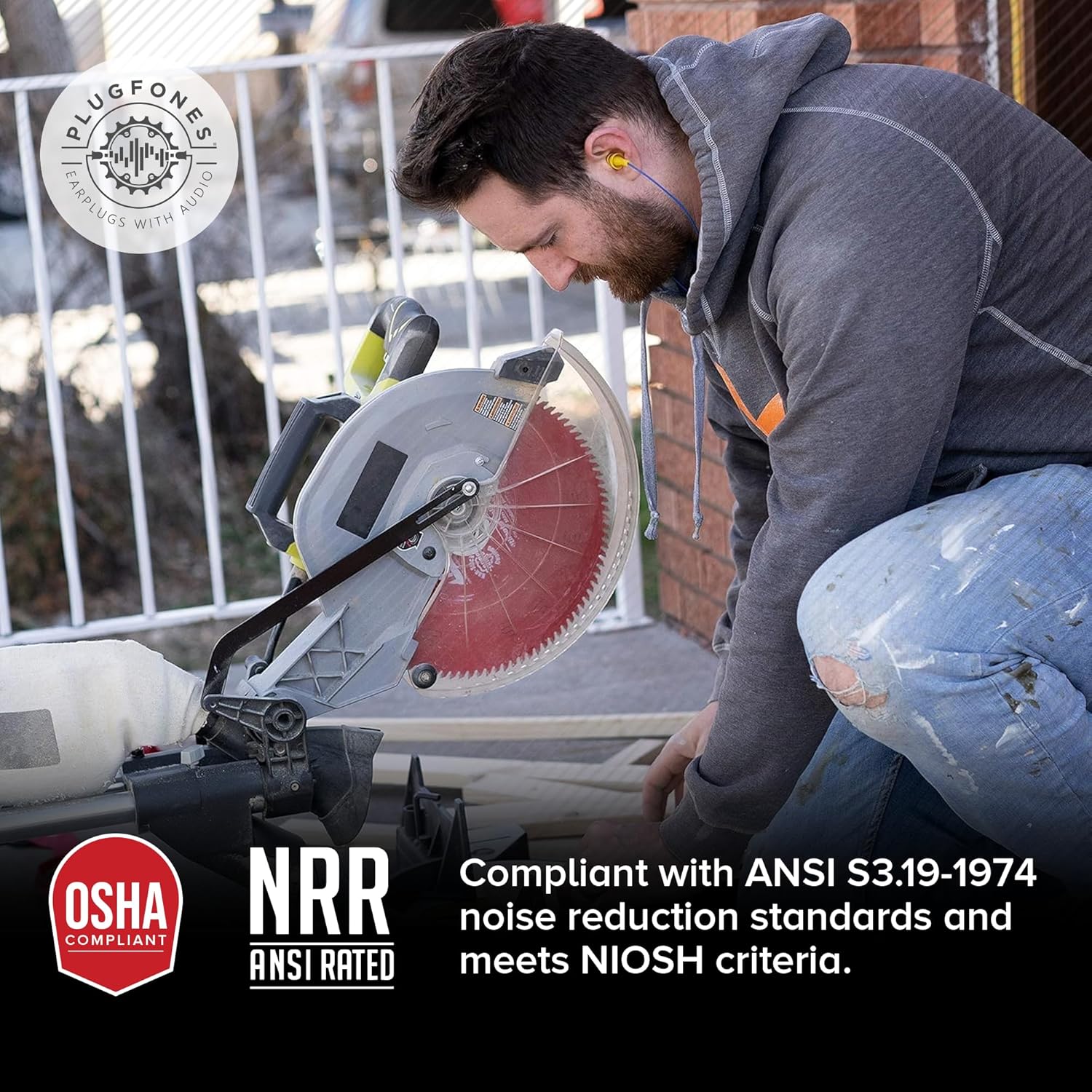 Man using a saw while wearing OSHA compliant Plugfones Basic Earplug Headphones