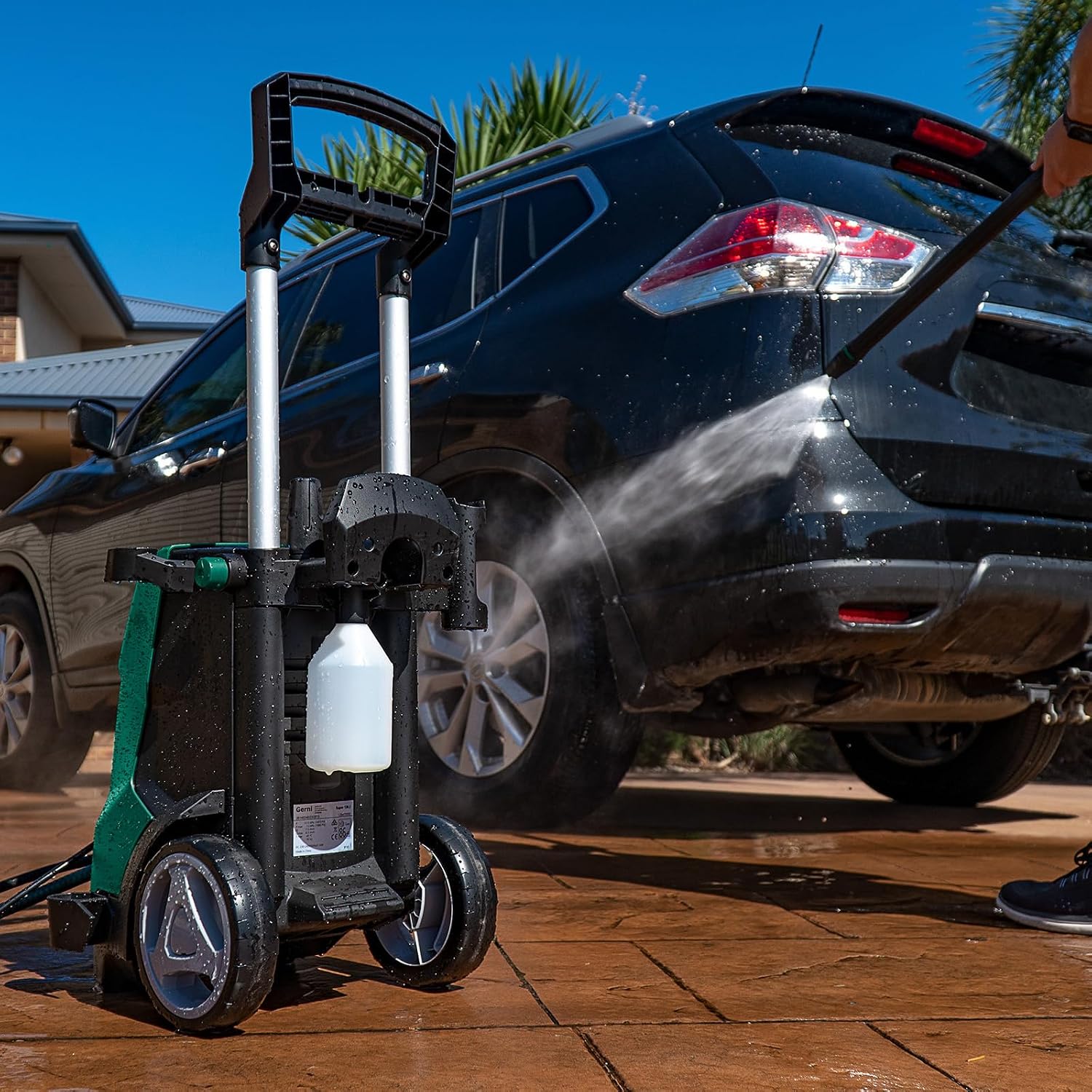 Gerni pressure washer in use cleaning a car