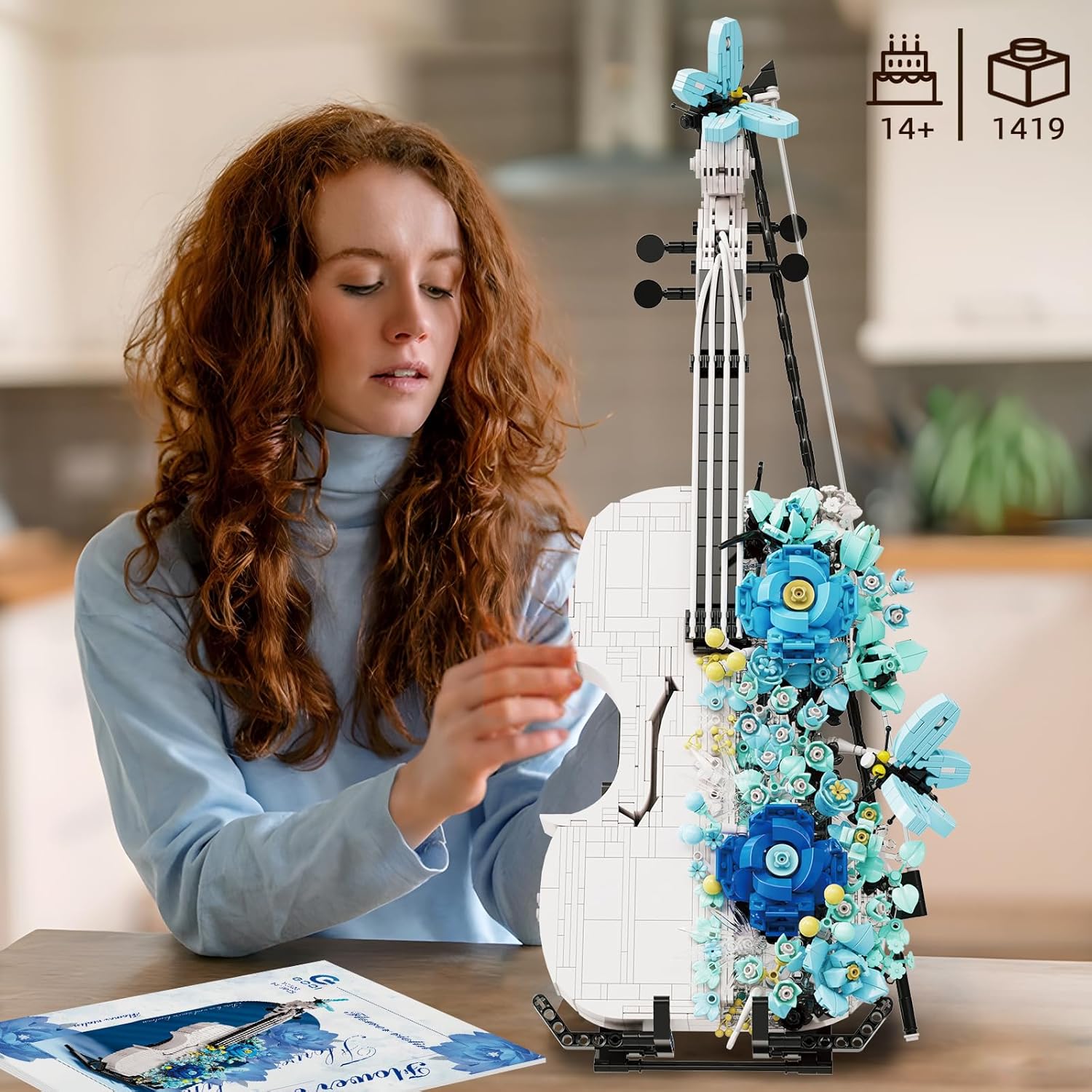 Person assembling the Mov stone Violin Toy Building Set