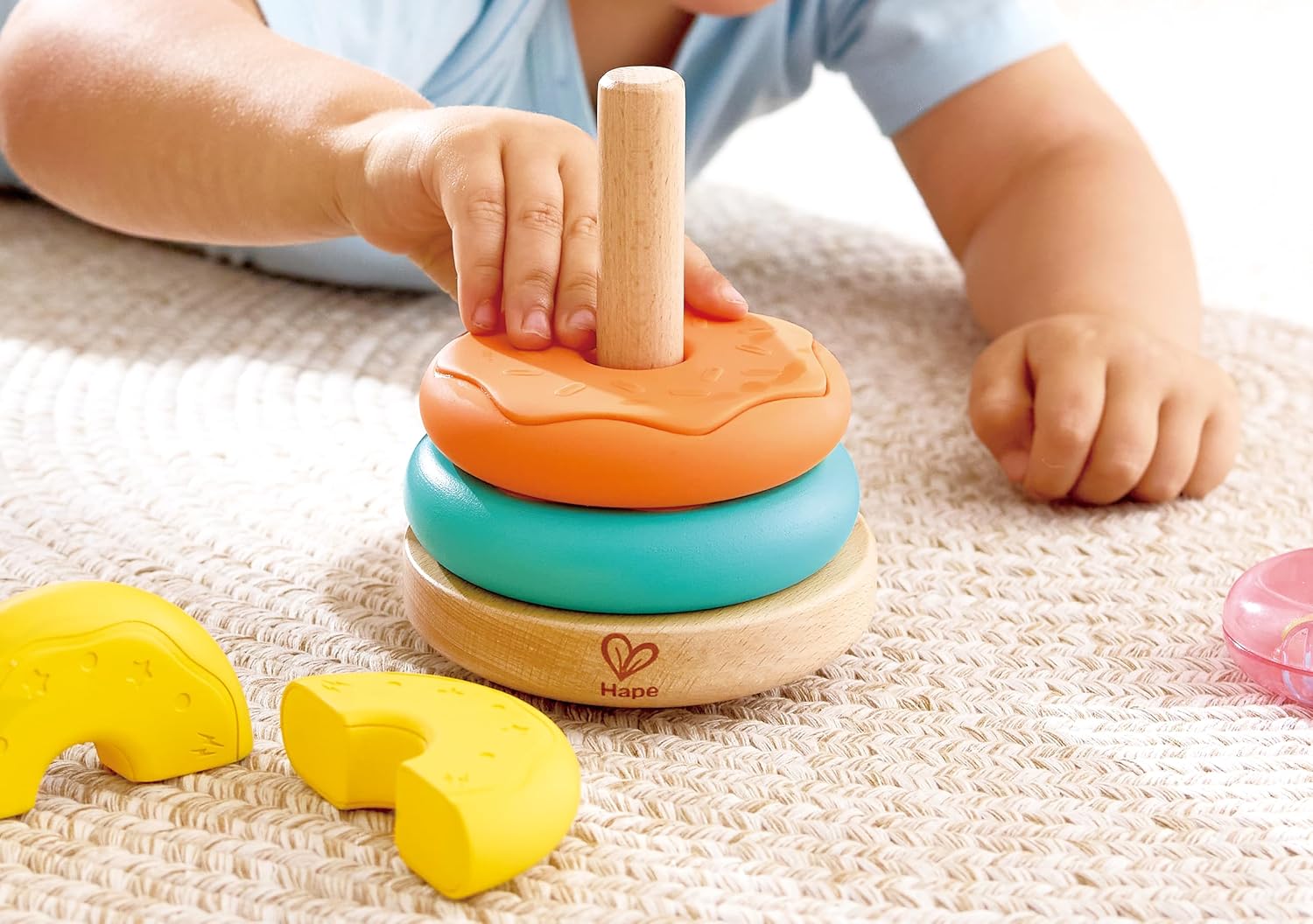Hape Wooden Stacking Donut Toy for Toddlers - 5 Piece Sensory Stacking Rings Set with Magnetic & Soft Textured Rings - Fine Motor Skills Educational Montessori Toy for Babies 18 Months to 4 Years