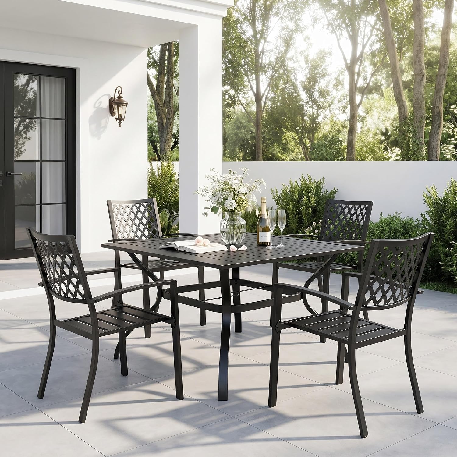 Sophia & William 5 piece black metal patio dining set with square table and four chairs on an outdoor patio