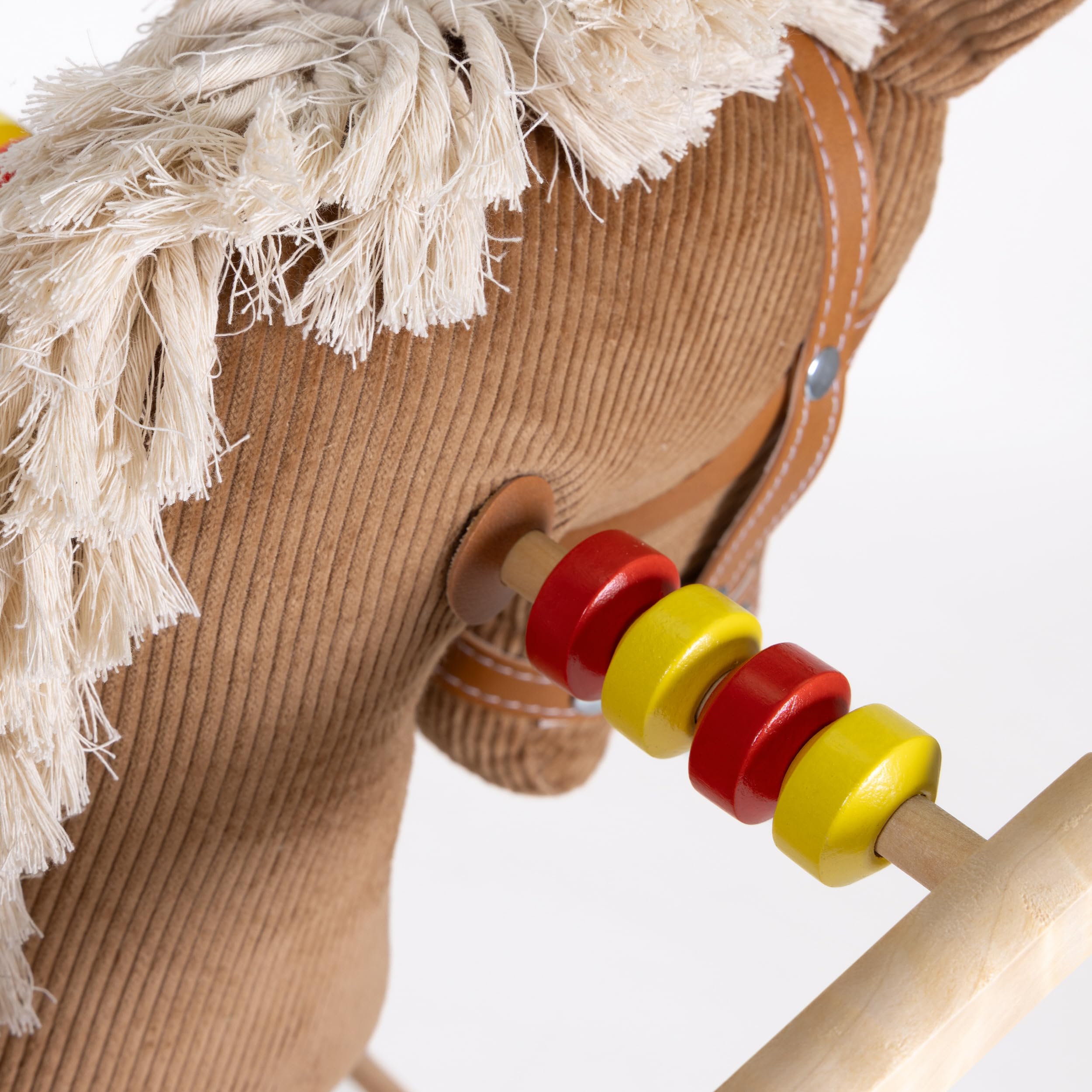Schaukelpferd Holz mit weichem Cord