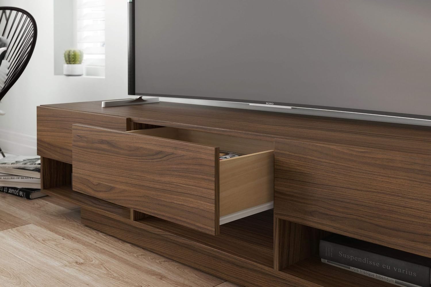 Close-up view of one of the three drawers on the Nexera Rustik TV Stand, slightly open to reveal its interior. The drawer features a smooth, wood-grain finish.