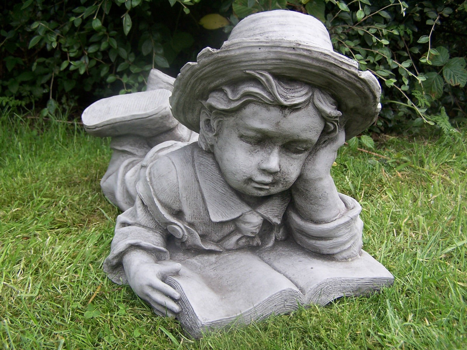 HomeZone Boy and Girl Laying and Reading Garden Ornaments Outdoor