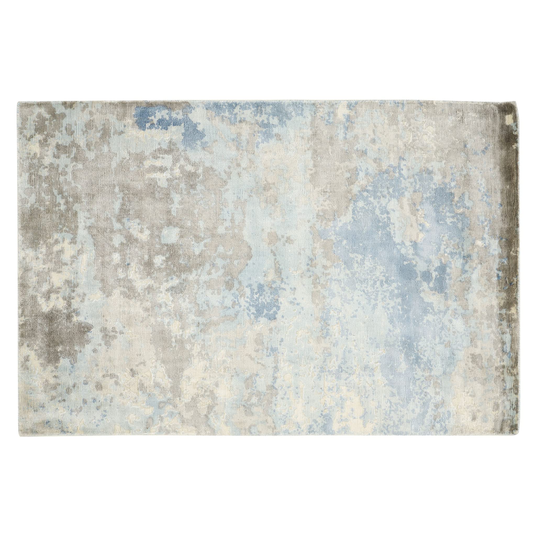 Rug Parma bleu dans votre salon pour créer une atmosphère chaleureuse et cosy