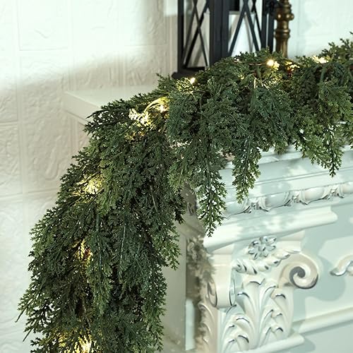 Guirnalda de Navidad realista con luces, 8 modos de iluminación, 6 pies, tacto real, exuberante, guirnalda artificial de cedro preiluminada para