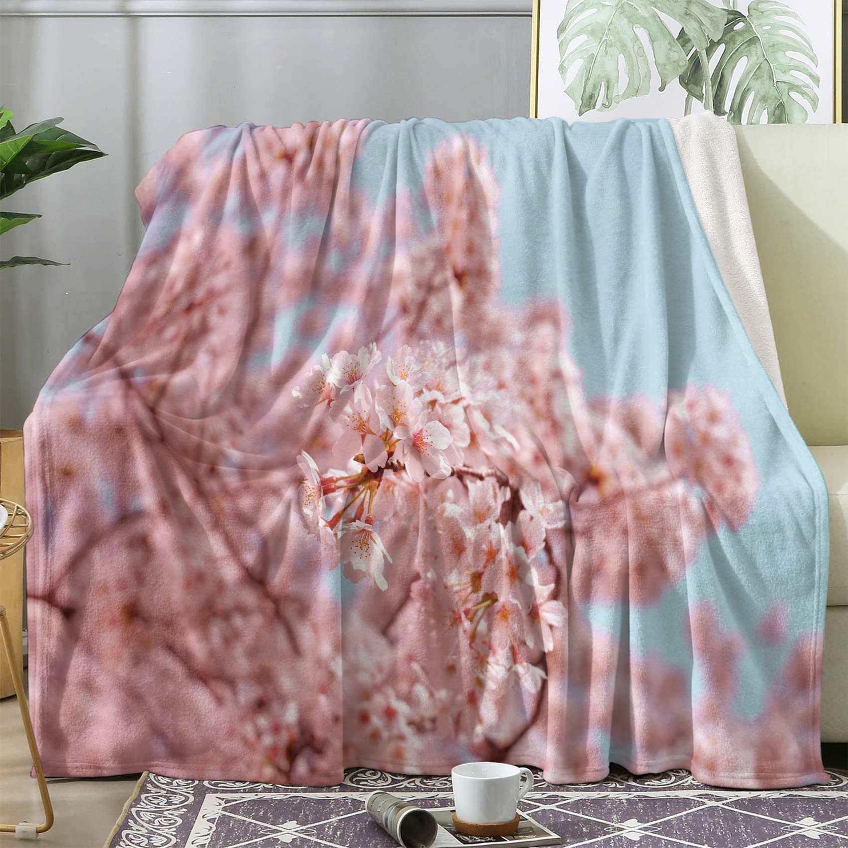 Plaid Canapé Fleurs de Cerisier BUKITA : Couverture Polaire Rose pour vos Soirées Cocooning