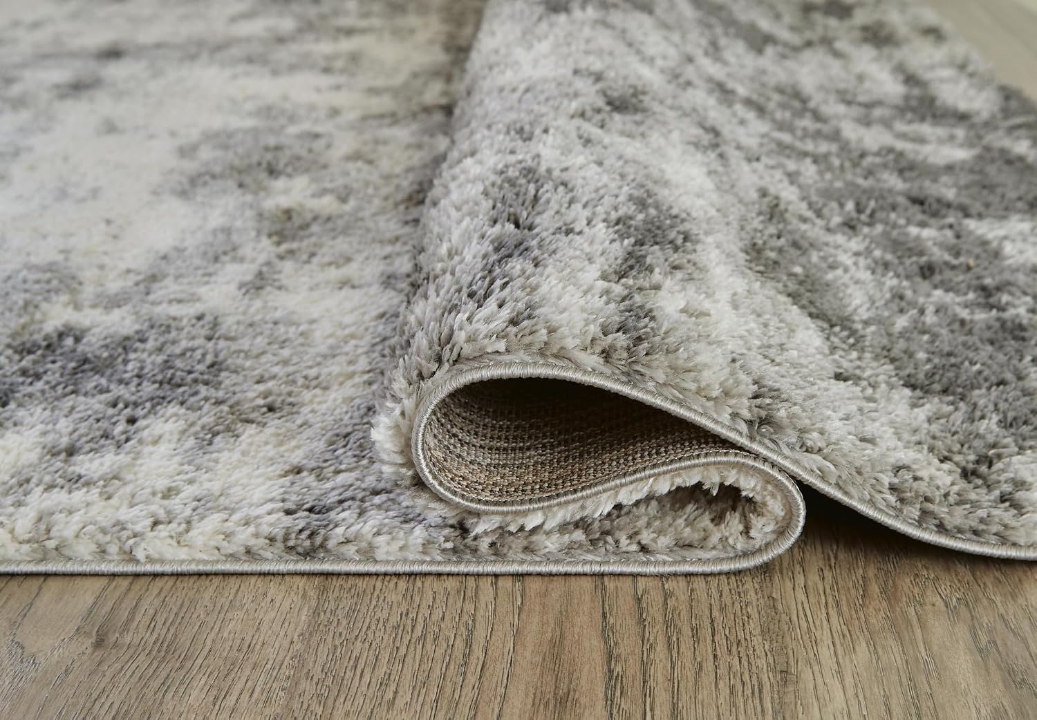 Signature Design by Ashley Abstract High Pile Area Rug, 5x7 Cream Gray | Contemporary 100% polyester construction for living rooms, Plush texture with jute backing, Gerdie Series
