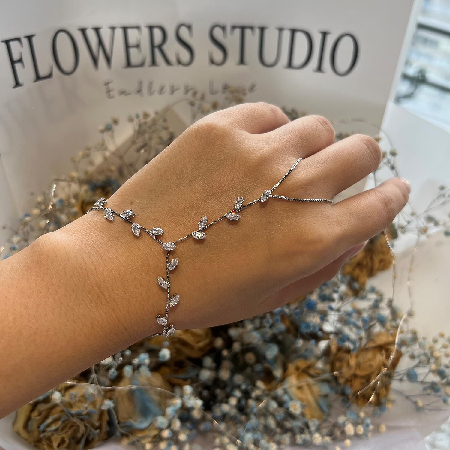 Mytys Cubic Zirconia Palm Chain Bracelet for Women Silver Color Hand Bracelet Cluster CZ with Ring Hand Harness Bangle